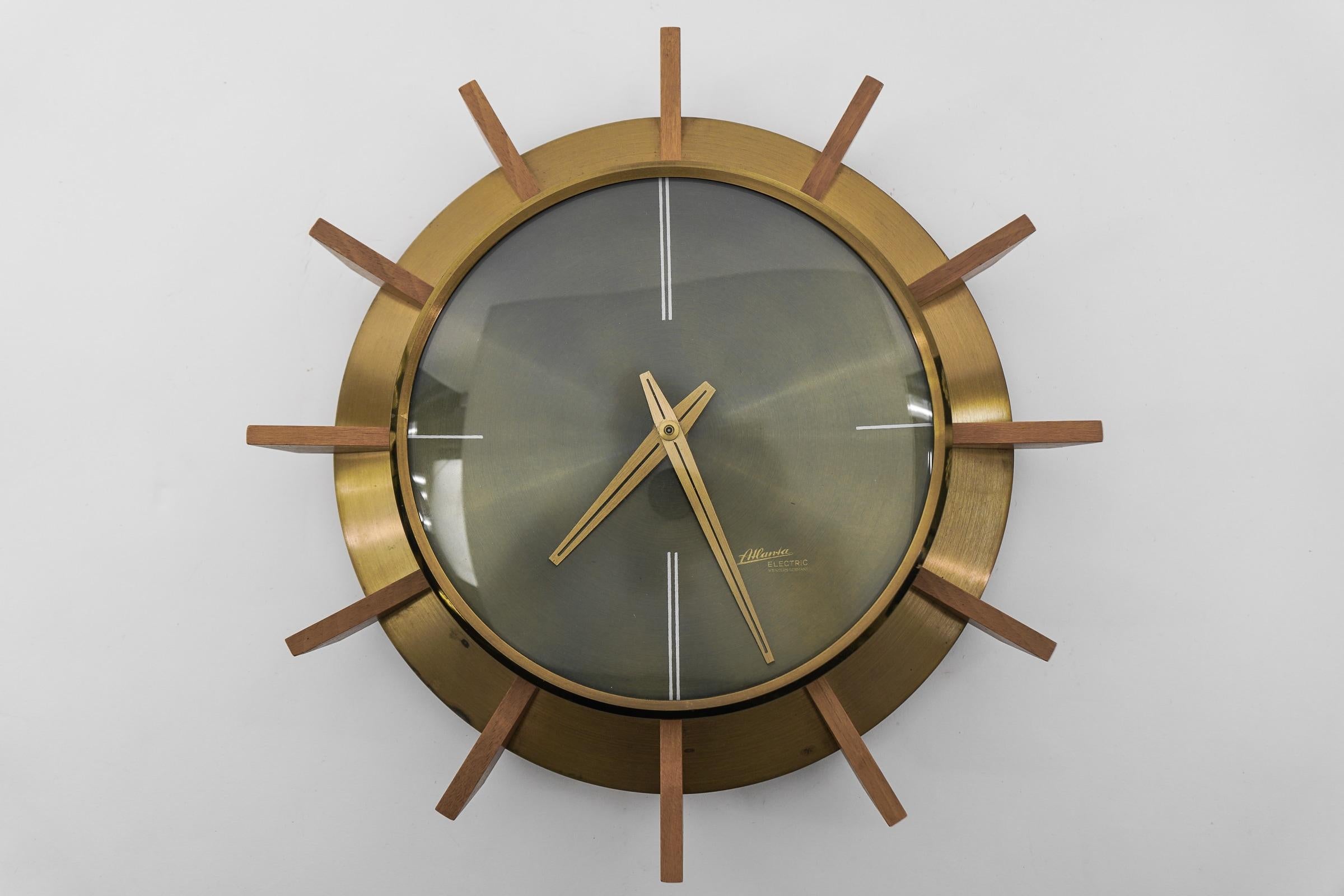 Mid-Century Modern Brass and Wood Sunburst Wall Clock by Atlanta Electric For Sale 1