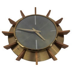 Mid-Century Modern Brass and Wood Sunburst Wall Clock by Atlanta Electric