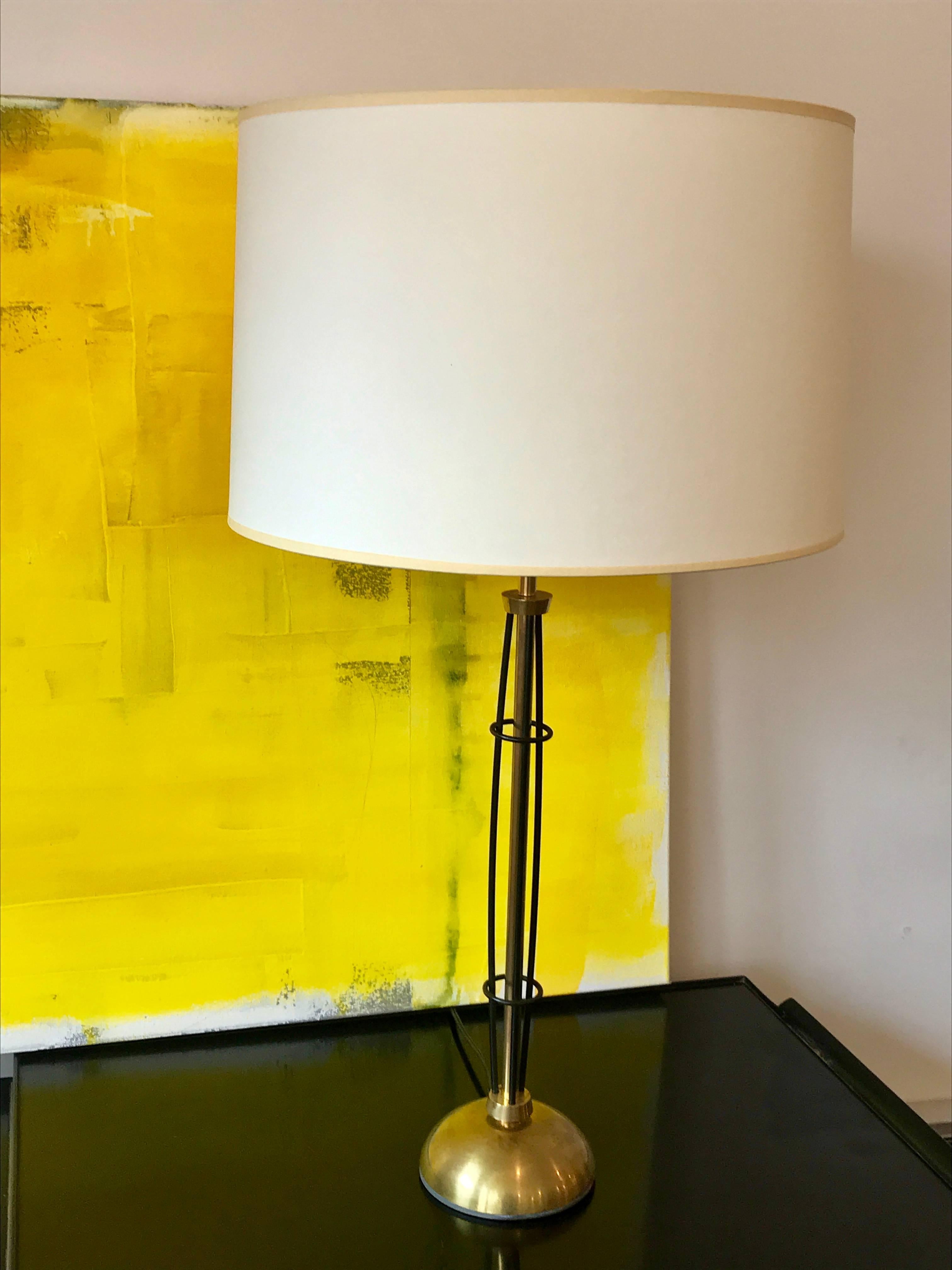 Very cool brass and wrought iron table lamp similar to the designs by Tony Paul, 1950s.

Rewired and professionally cleaned. Shade not included.