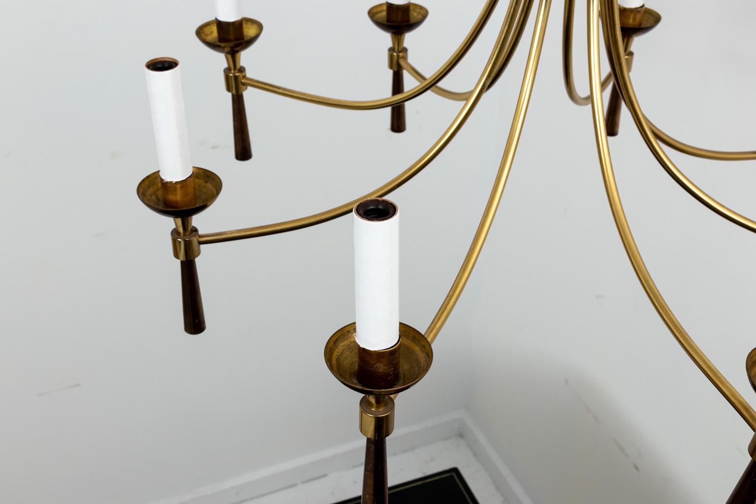 Mid-Century Modern style eight arm brass chandelier. Shades not included. Please note of wear consistent with age including minor patina.