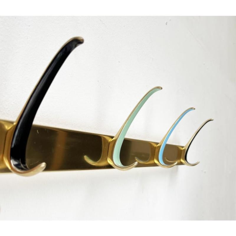 Mid-Century Modern Brass Coat Rack, 1960s, in Very Good conditions. Designed 1960 to 1969

Additional information:
Materials: Metal
Color: Black
Period: 1960s
Item Type: Vintage, Antique or Pre-owned
Styles: Mid-Century Modern
Dimensions: 23.23ʺW ×