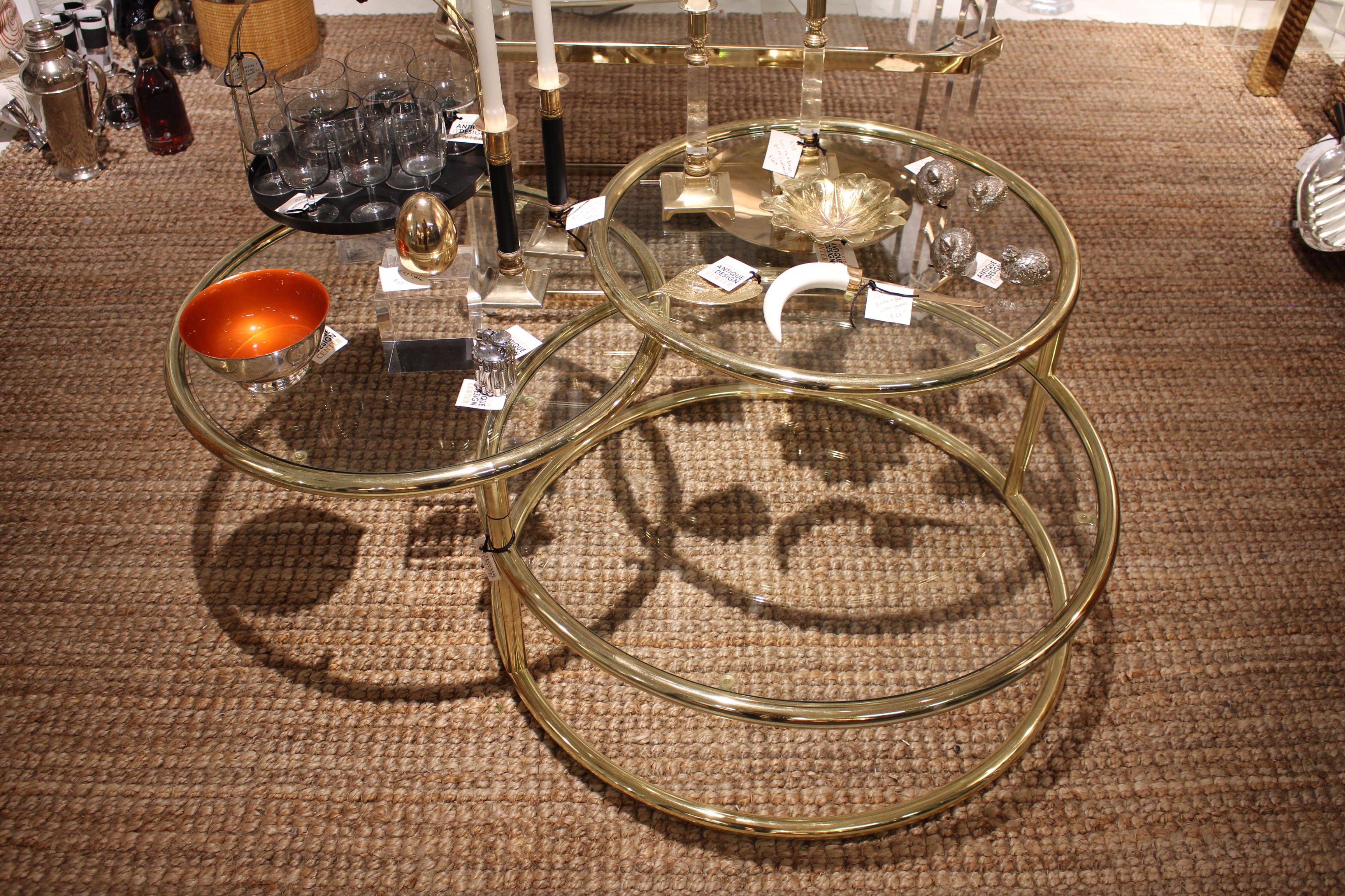 Round swivel top coffee table. Can be rotated in multiple position. Three tier, very versatile and beautiful center piece.