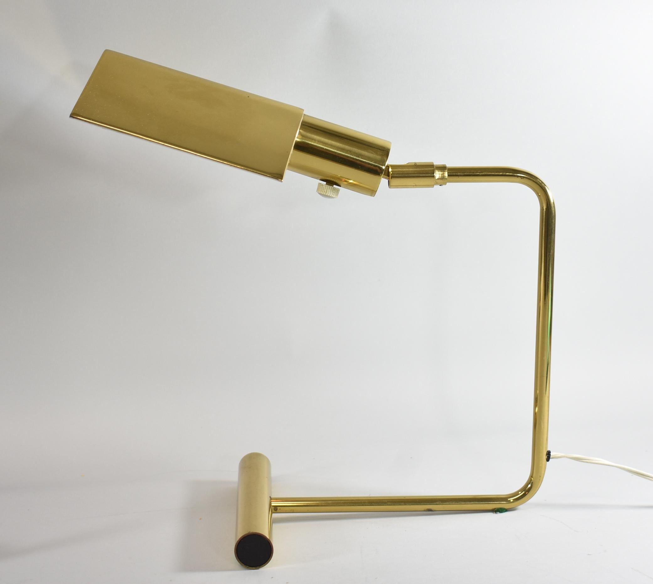 Mid-Century Modern desk lamp by Koch & Lowy, circa 1960s. Tent shade, base and shaft are made of brass. Shade adjusts.