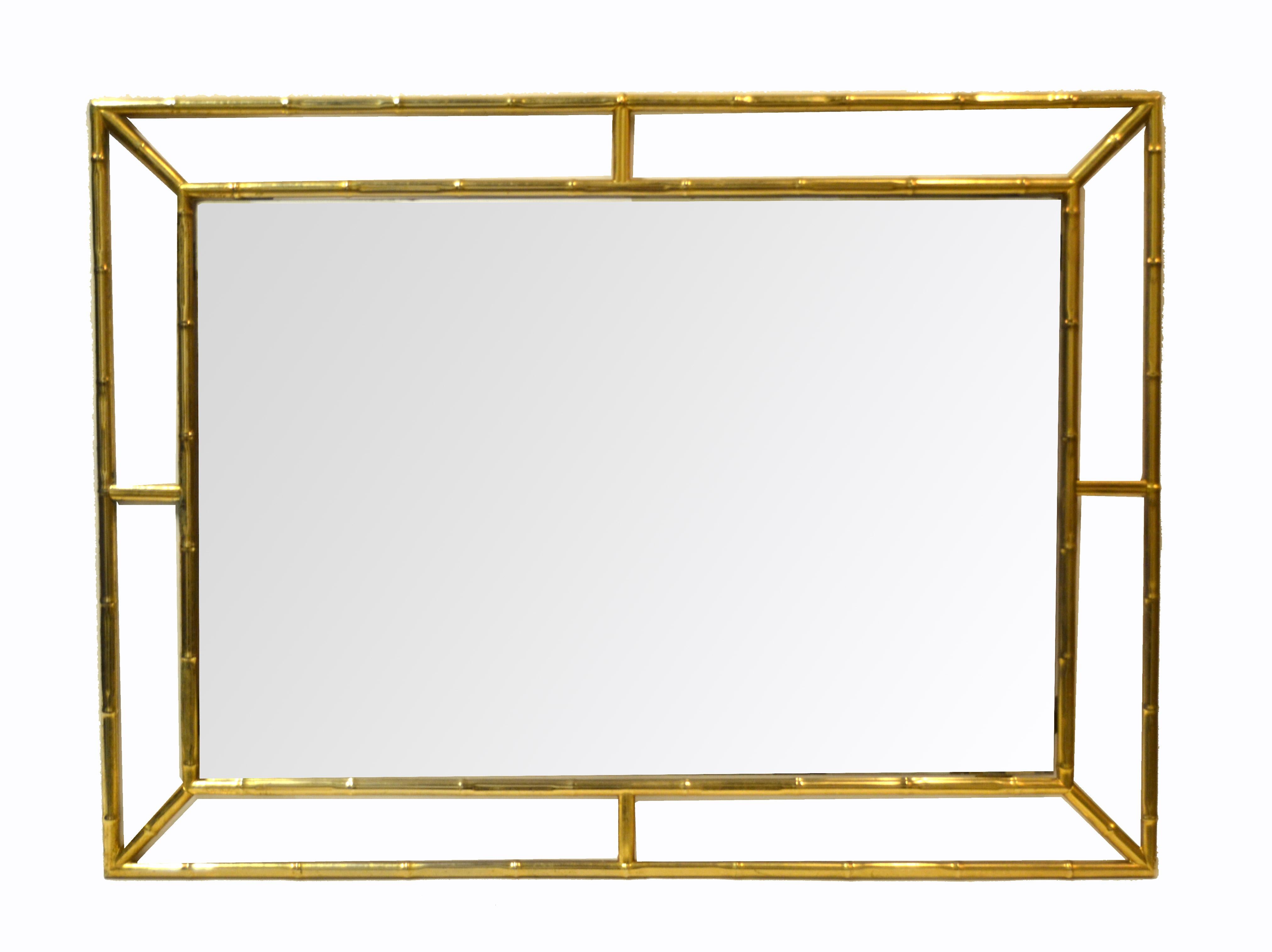 Mid-Century Modern brass faux bamboo wall mirror made in Italy, late 1970s.
Can be hung horizontal.
Light foxing to mirror glass as documented in the pictures.
Mirror size: 21.5 x 32.5 inches.