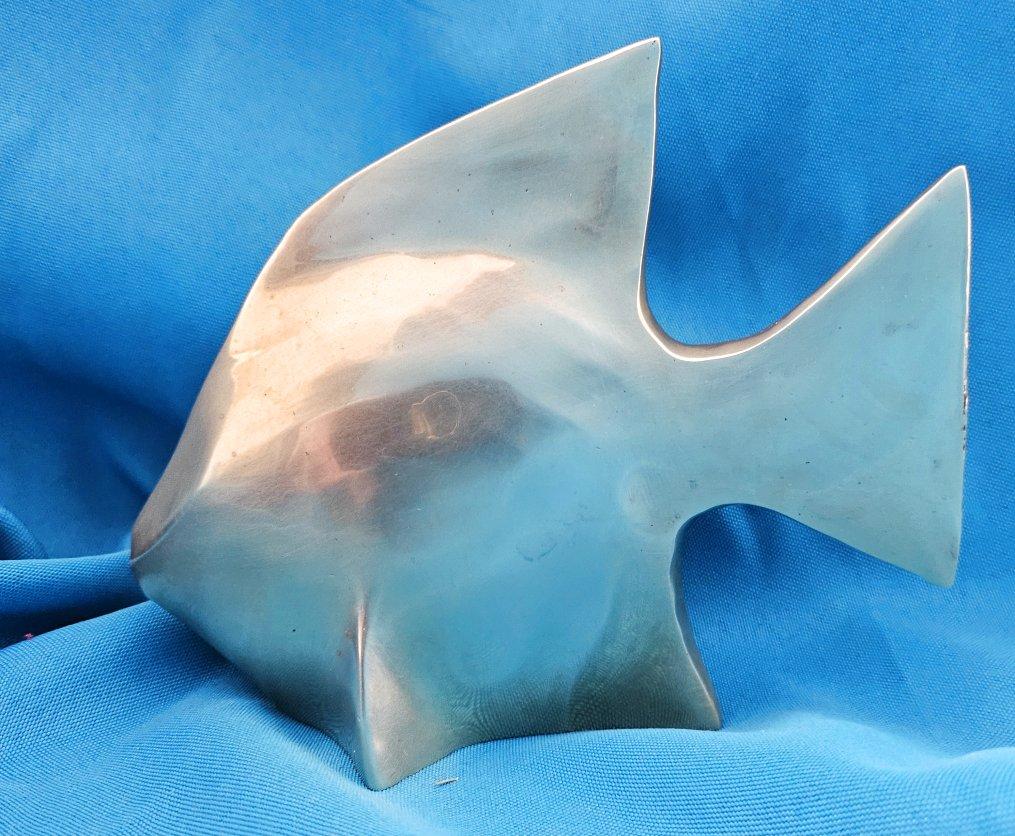 Mid-Century Modern Brass Fish Sculpture in the style of Andre Bloc. 
UPDATE: Due to agreement with 1stDibs, we'll be staying through the end of the year.
Could this be an Andre Bloc piece?  Whether it is or isn't, we really love its minimalist,