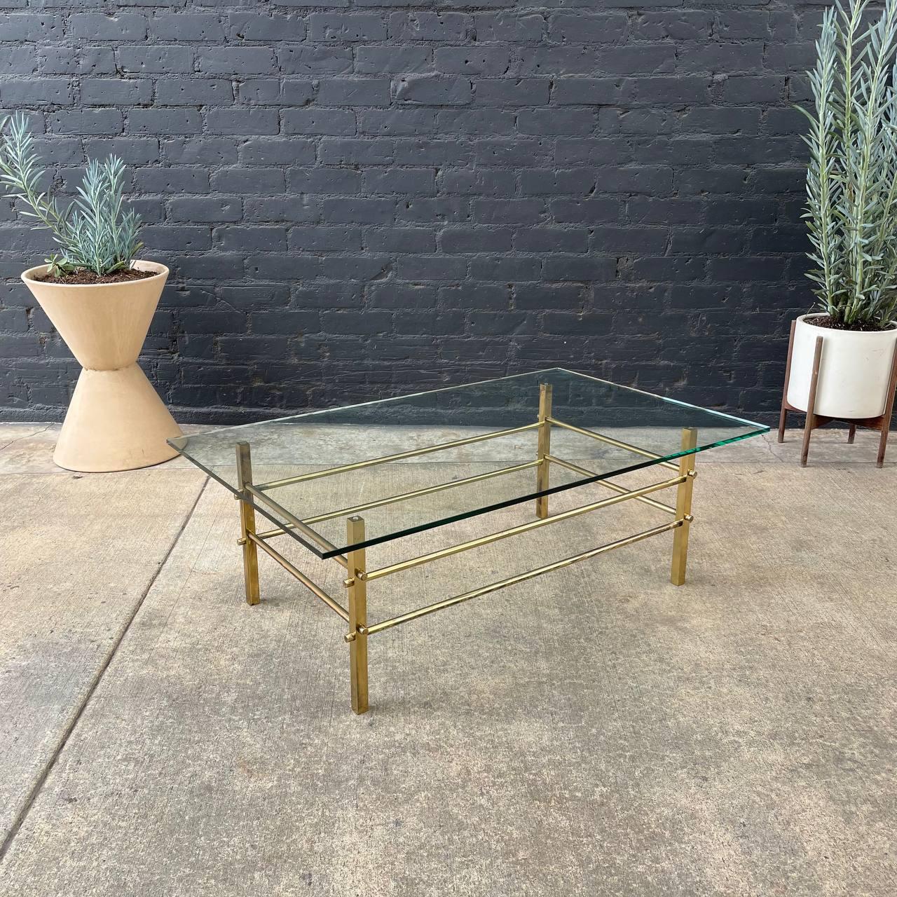 Mid-Century Modern brass & glass coffee table.