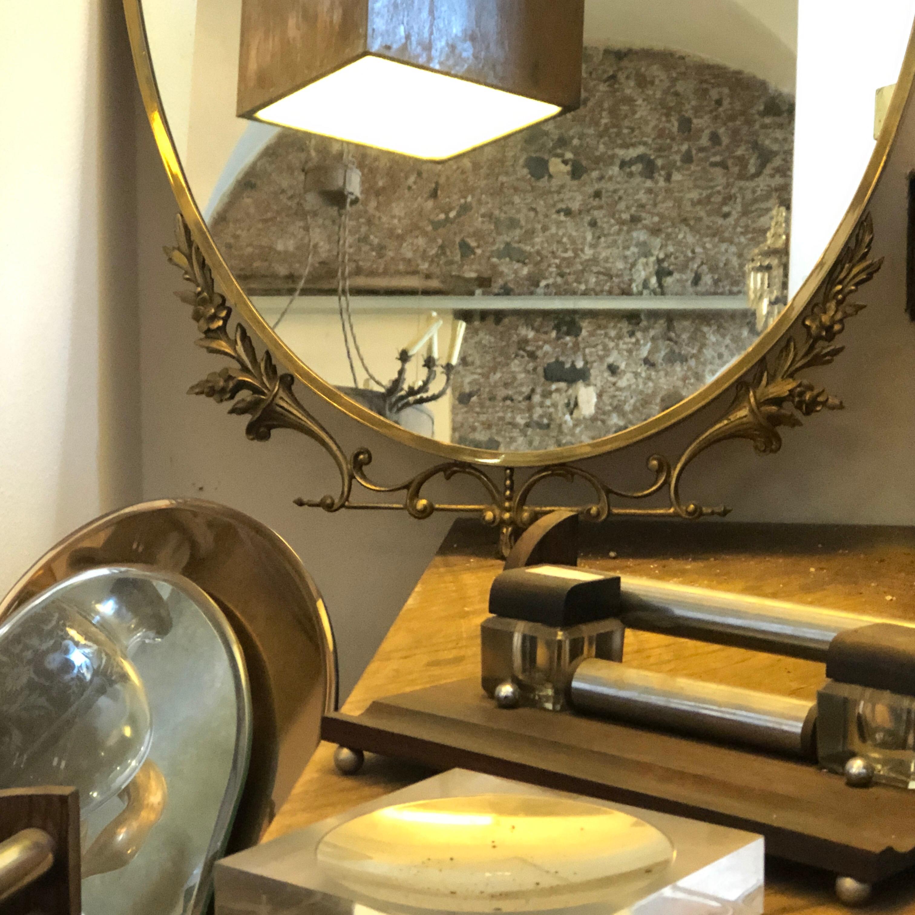 An oval mirror in perfect condition in the style of Pier Luigi Colli made in Italy in the 1960s.