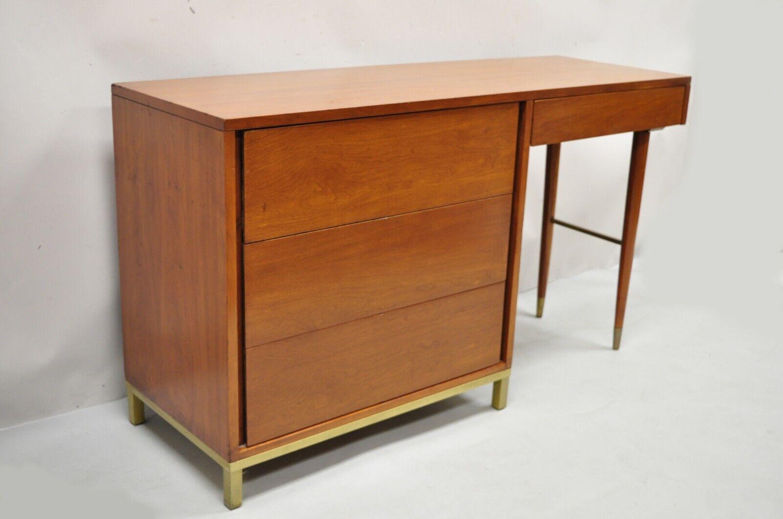 Mid-Century Modern brass legs and base walnut kneehole writing desk modernist. Item features unique brass base and stretcher support, beautiful wood grain, 4 dovetailed drawers, tapered legs, clean modernist lines, great style and form. Circa mid