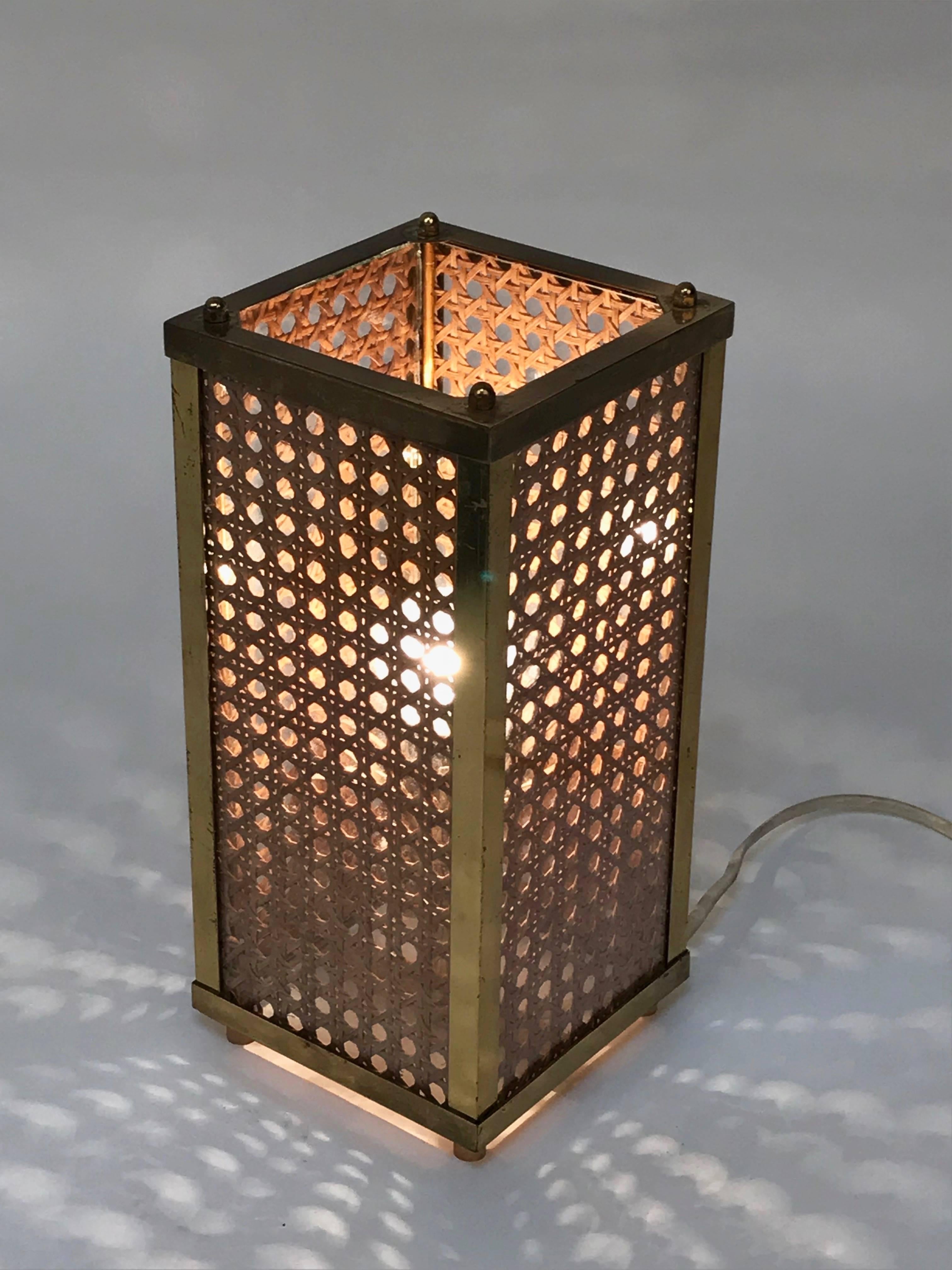 Detail Italian table lamp, circa 1970s. On creates a special and beautiful atmosphere. Italian brass, Lucite and rattan.