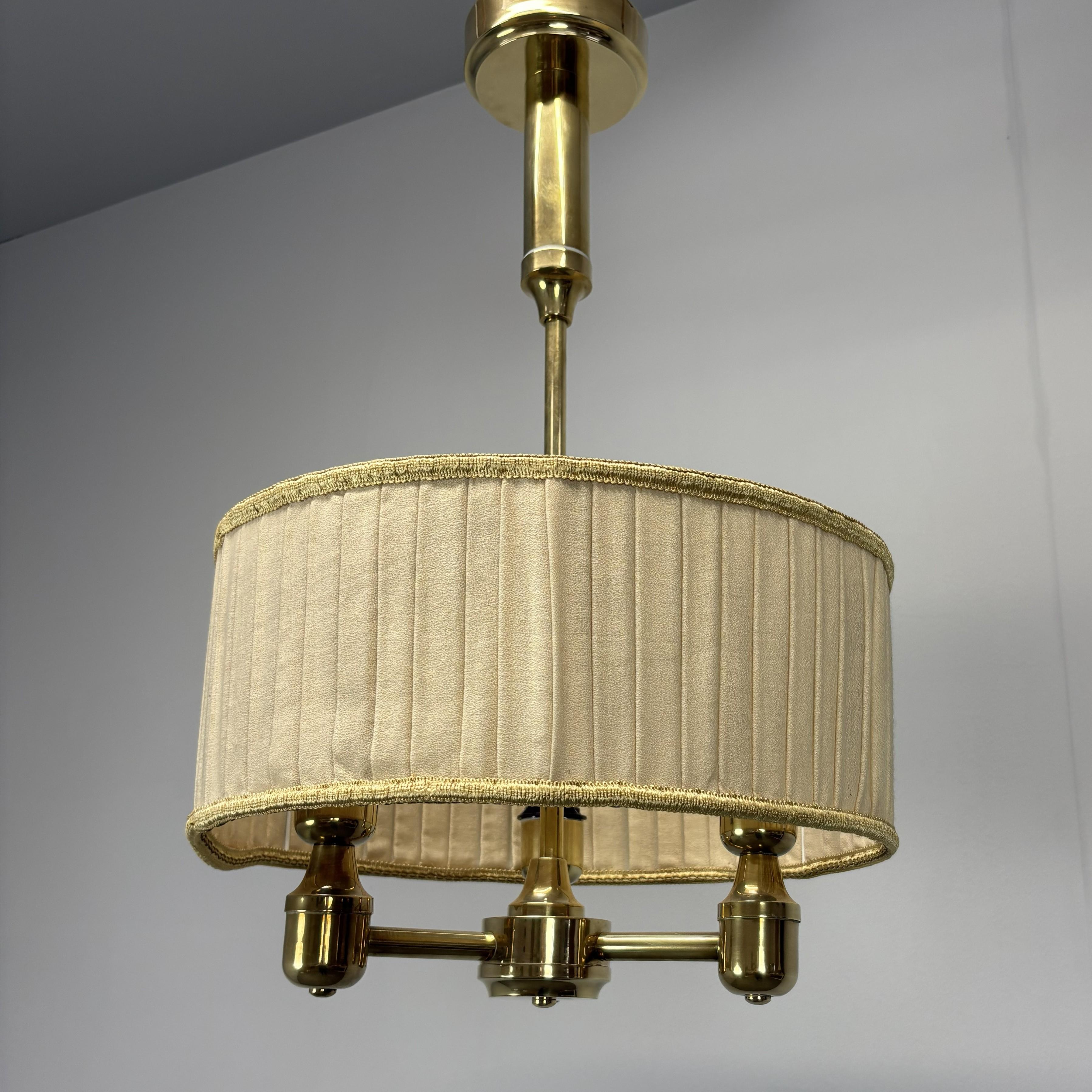 - Mid-Century Modern Brass Pendant , 1960s, Germany,
- made of  fabric, metal and brass,
- shows signs of wear and age (scratches, etc.),
- in good original condition.