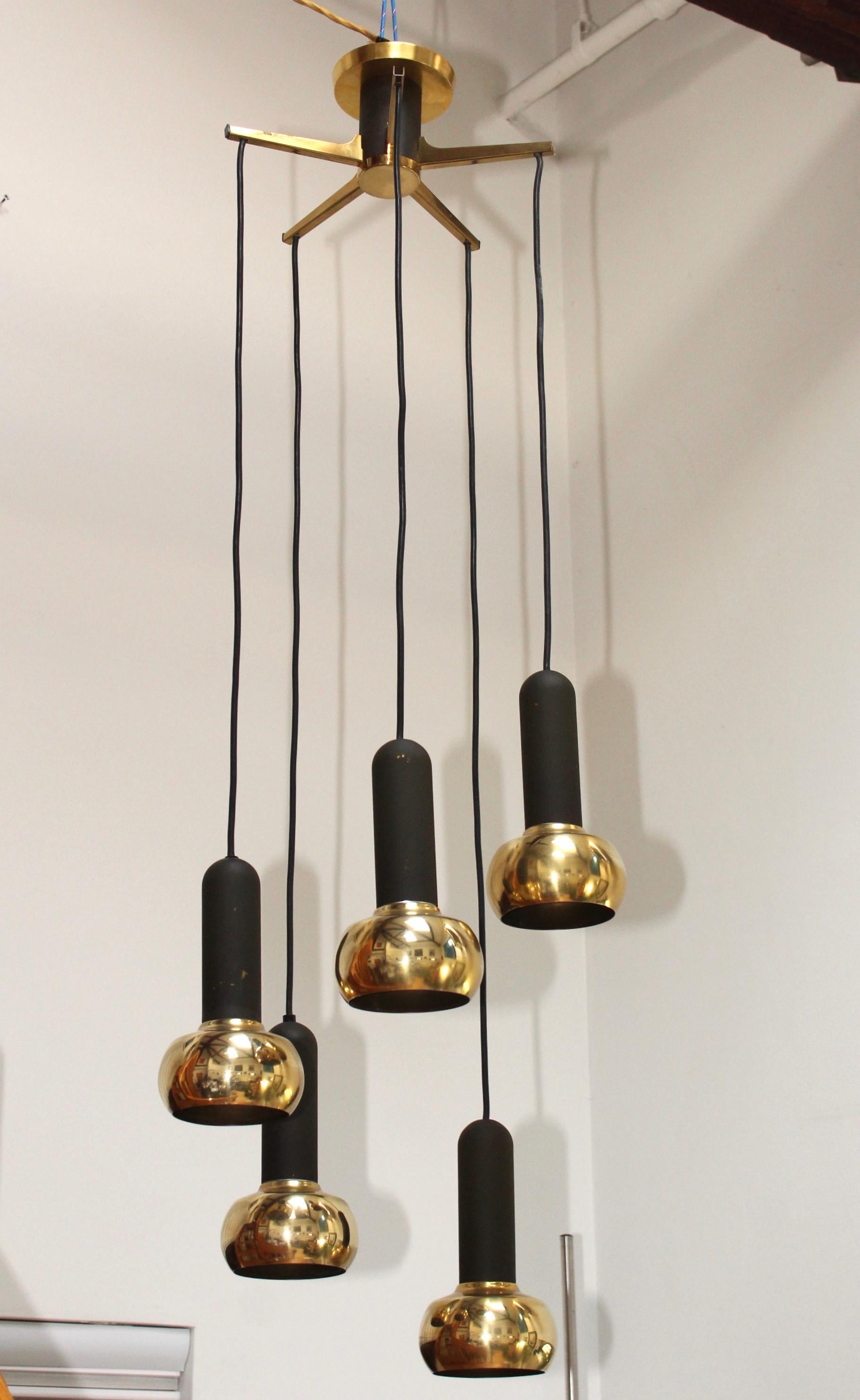 Stunning 1970s brass 5-light pendant by Sische, Germany. In vintage original condition, with some wear and patina due to age and use.