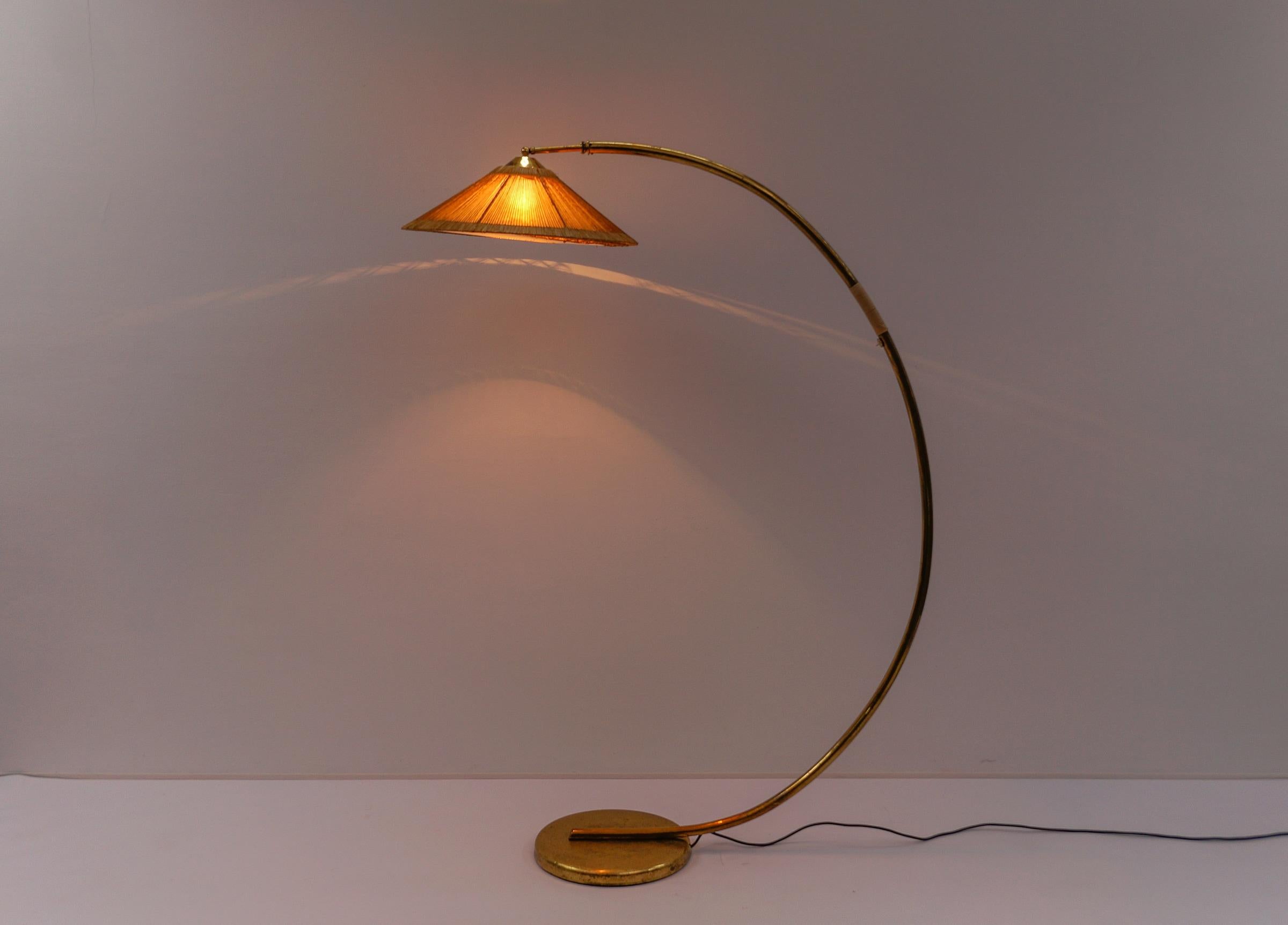 Austrian Mid-Century Modern Brass & Rattan Arc Floor Lamp, Italy 1950s For Sale