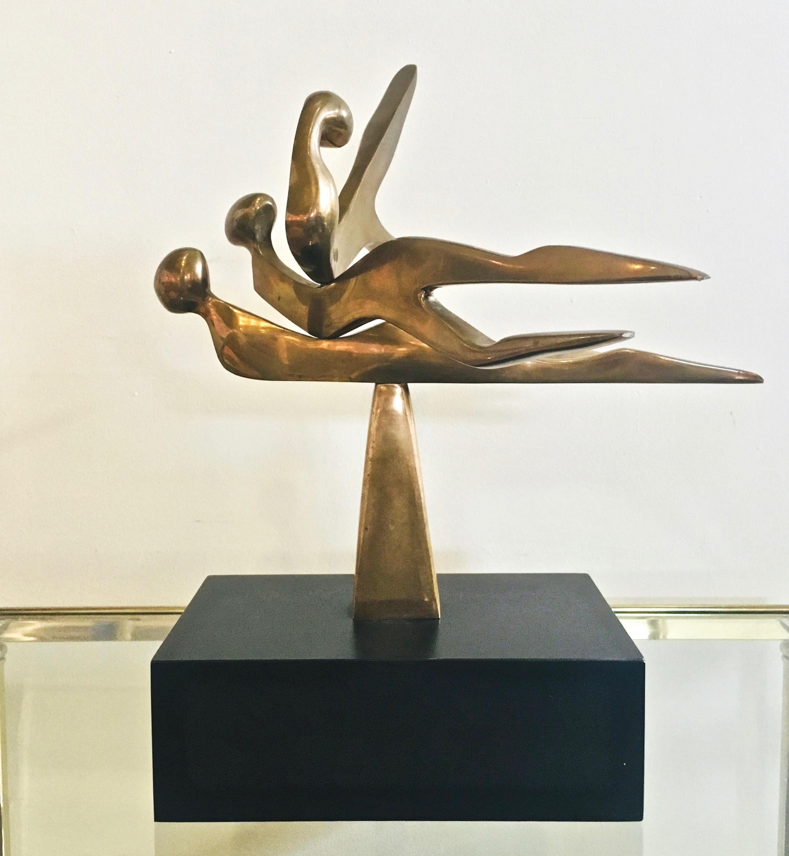 Abstract (solid brass) kinetic sculpture, by Arleen Eichengreen and Nancy Gensburg (American, 20th Century), Untitled, [Three Forms], figural sculpture of interacting brass forms each able to move independently, atop a solid brass pyramid mounted on