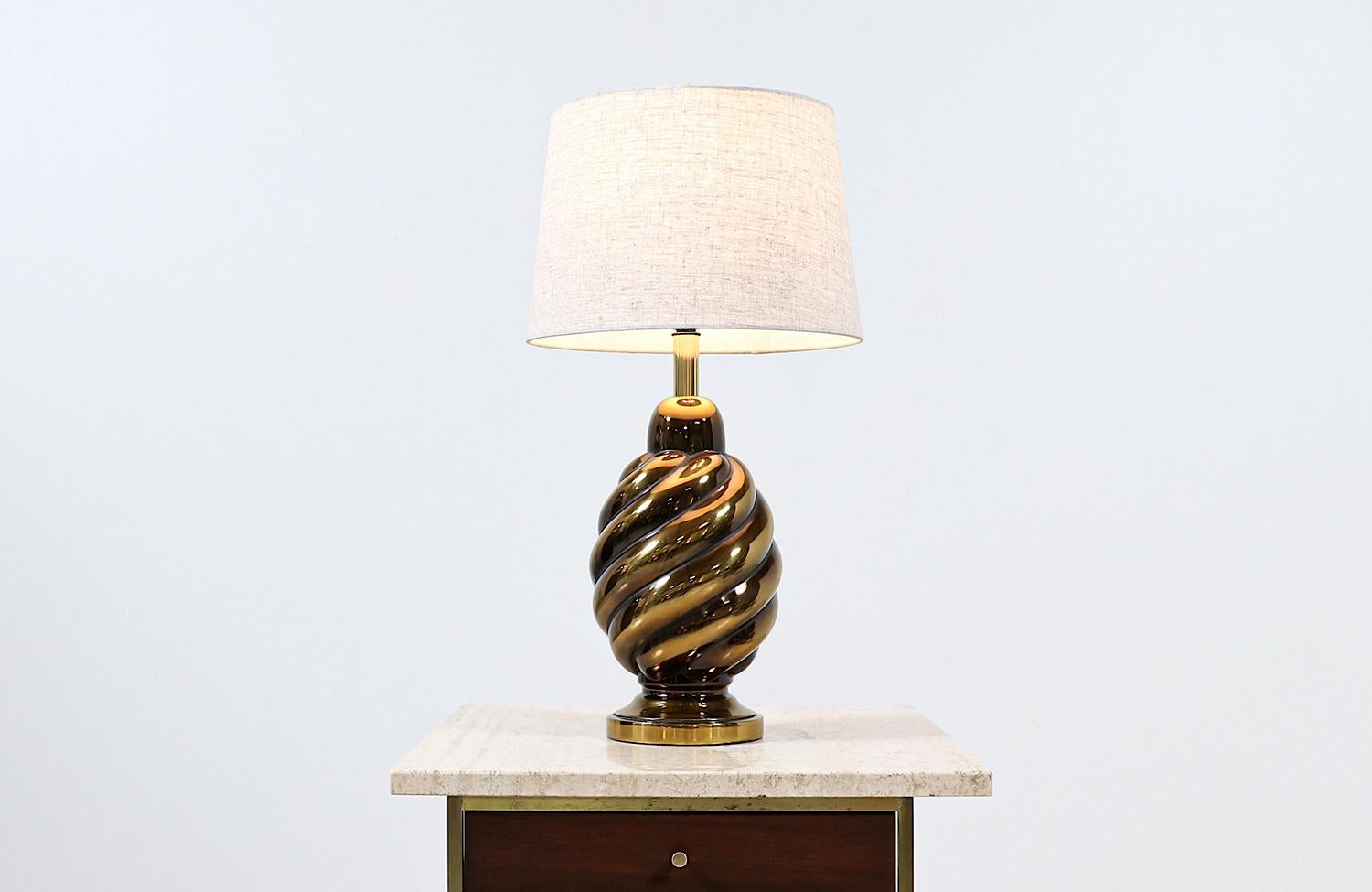 Dimensions:

24in H x 7in W x 7in D
Lamp Shade: 9in H x 11in - 13in W.

________________________________________

Transforming a piece of Mid-Century Modern furniture is like bringing history back to life, and we take this journey with passion and