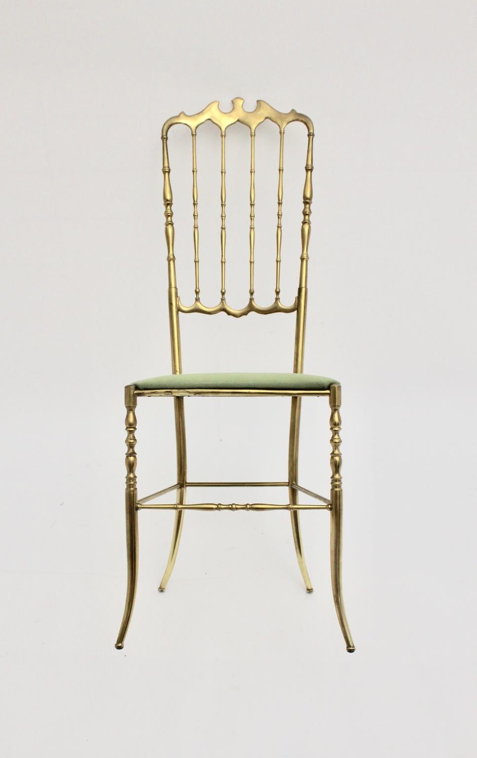 Mid Century Modern delightful vintage brass Chiavari side chair 1950s, Italy, shows a brass frame and a seat, which is newly covered with green textile fabric.
The vintage condition is very good.
Approximate measures:
Width 42 cm
Depth 41 cm
Height