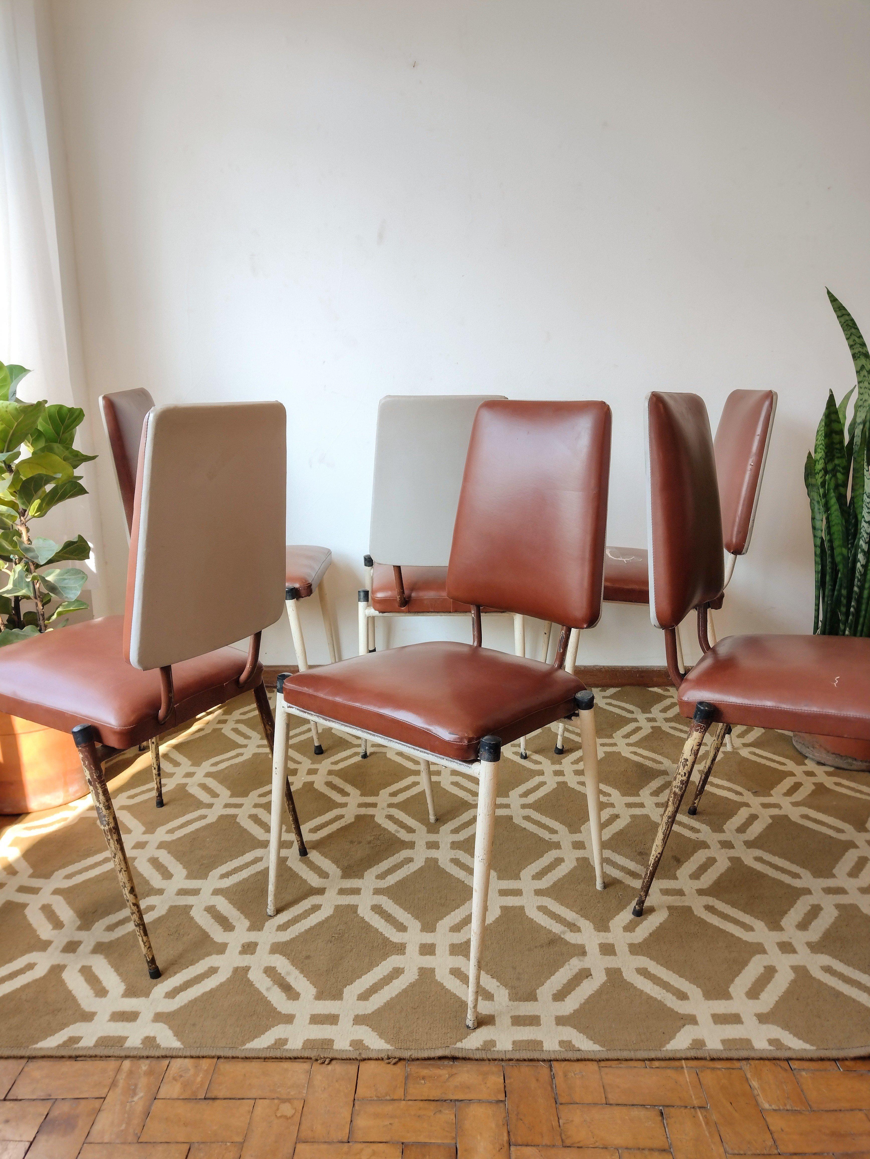 Set of 6 Mid-Century Modern Brazilian Brown and Gray chairs with iron structure painted in offwhite and seat/backrest covered in brown and gray courvin (faux leather). Chair is comfortable and has a high and straight back, keeping the spine more