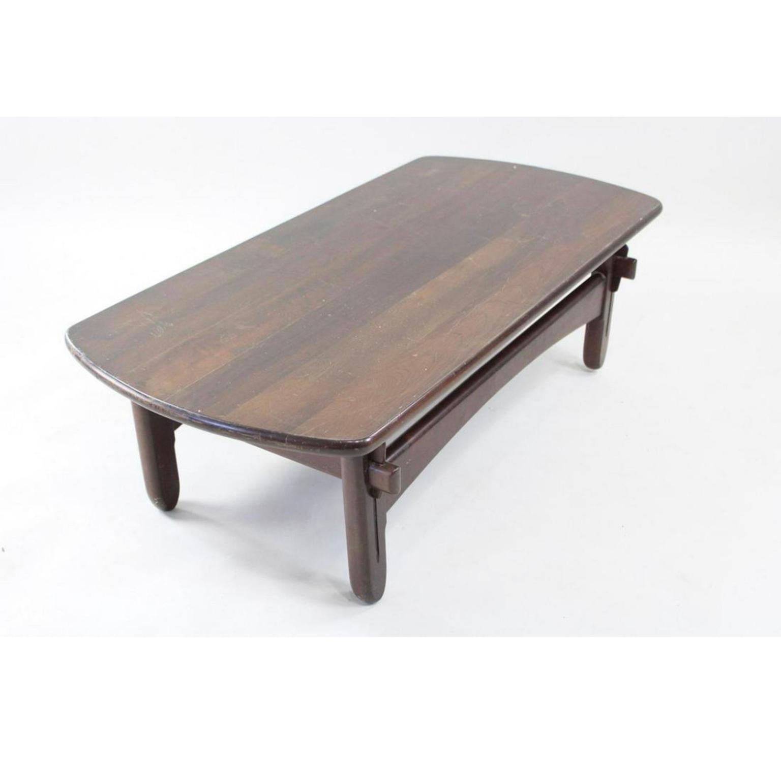 Rare Mid-Century Modern Sergio Rodrigues solid jacaranda wood coffee table. Beautiful design all solid wood very heavy and dense. Brazilian Mid-Century Modern design. Beautiful Table. Made in Brazil. Located in Brooklyn NYC.

Measures 47