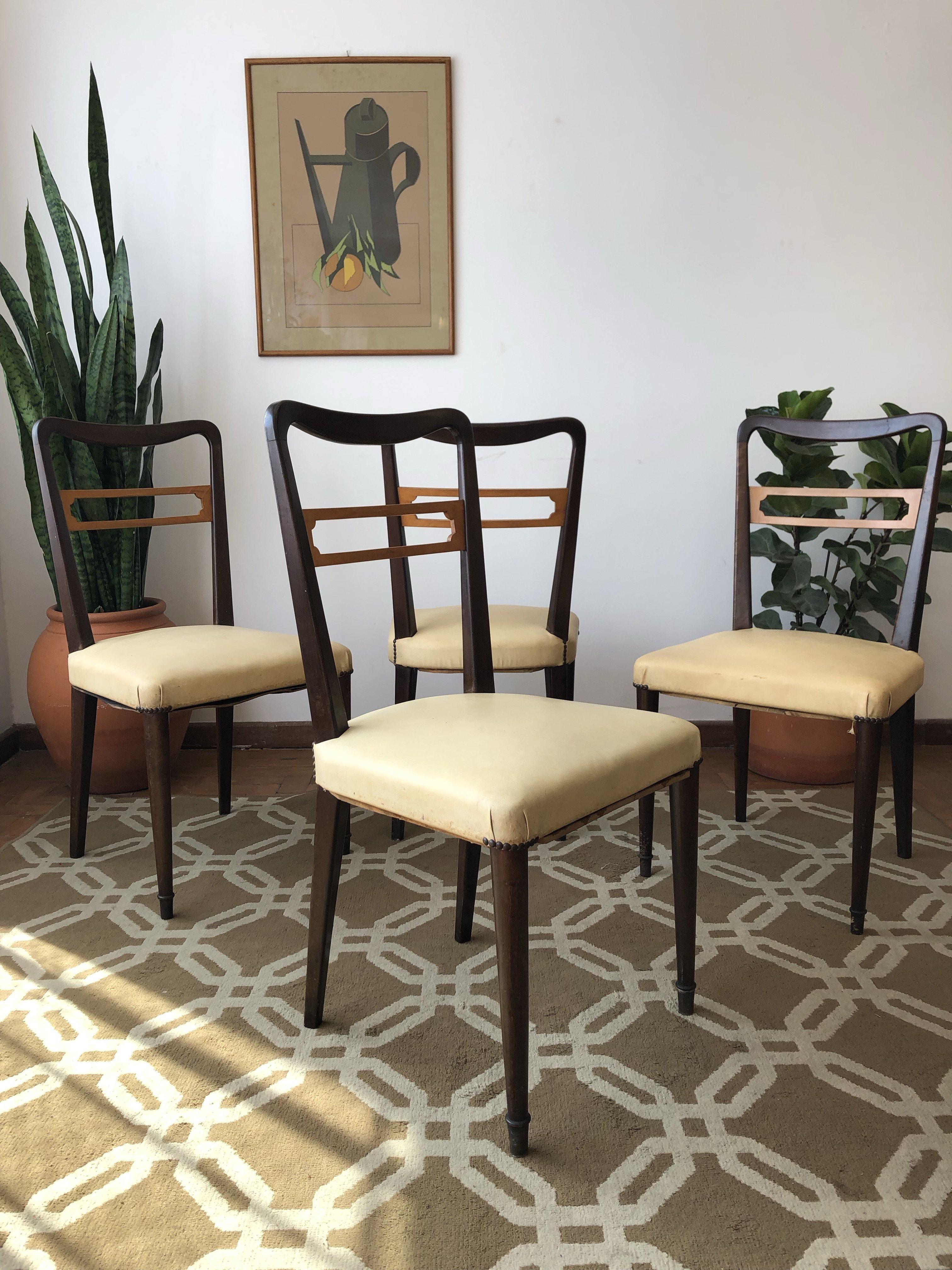 Mid-Century Modern Brazilian set of 4 dinning room chairs in solid wood structure and seat with light yellow courvin (faux leather) upholstery. It has light wood detailing on the backrest. Robust, resistant and comfortable structure. In good