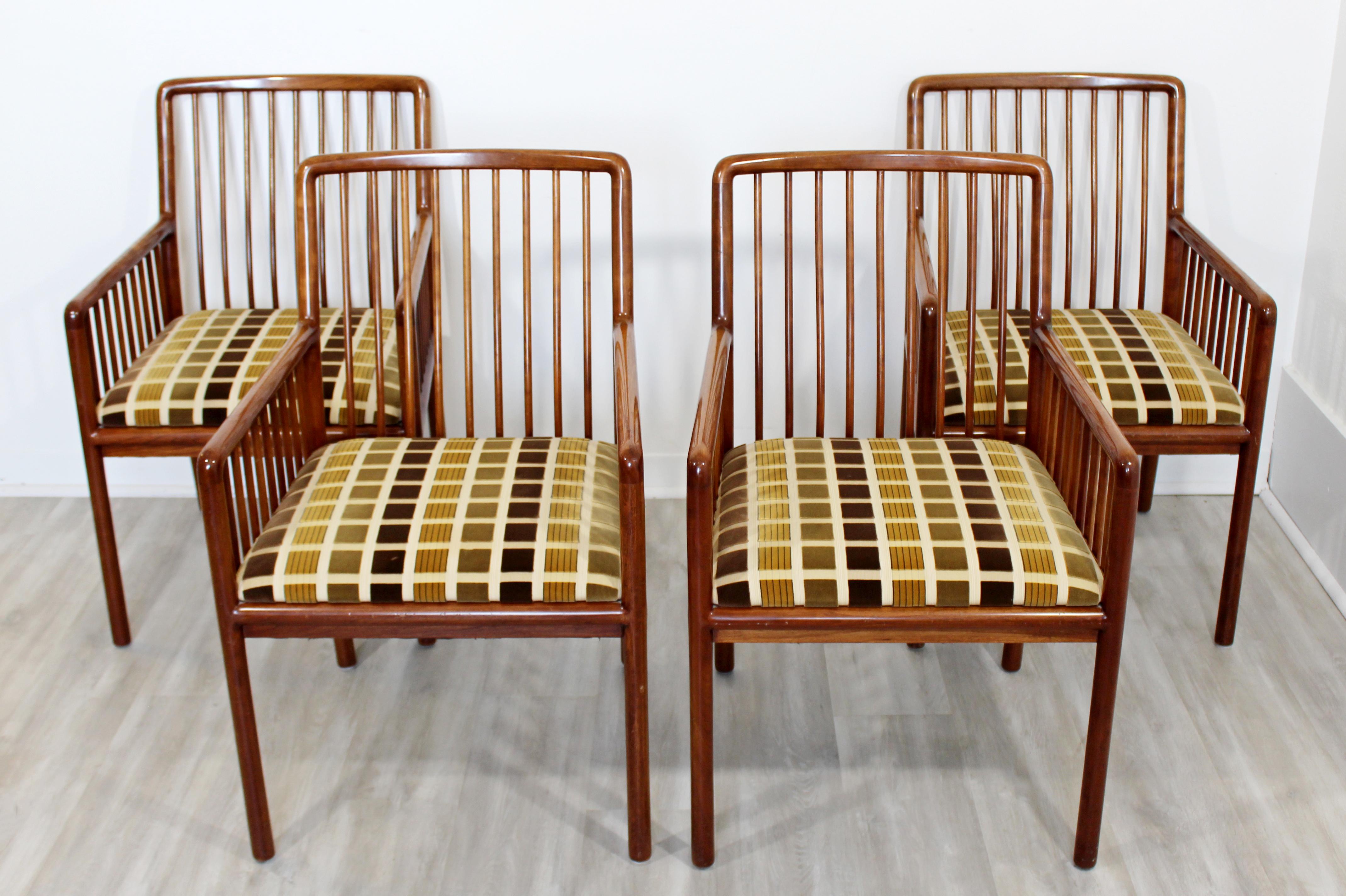 For your consideration is a charming, custom set of four, cherrywood, spindle backed side chairs by Brickell Associates, circa 1970s. In excellent vintage condition, with some very minor wear to the fabric. The dimensions are 24