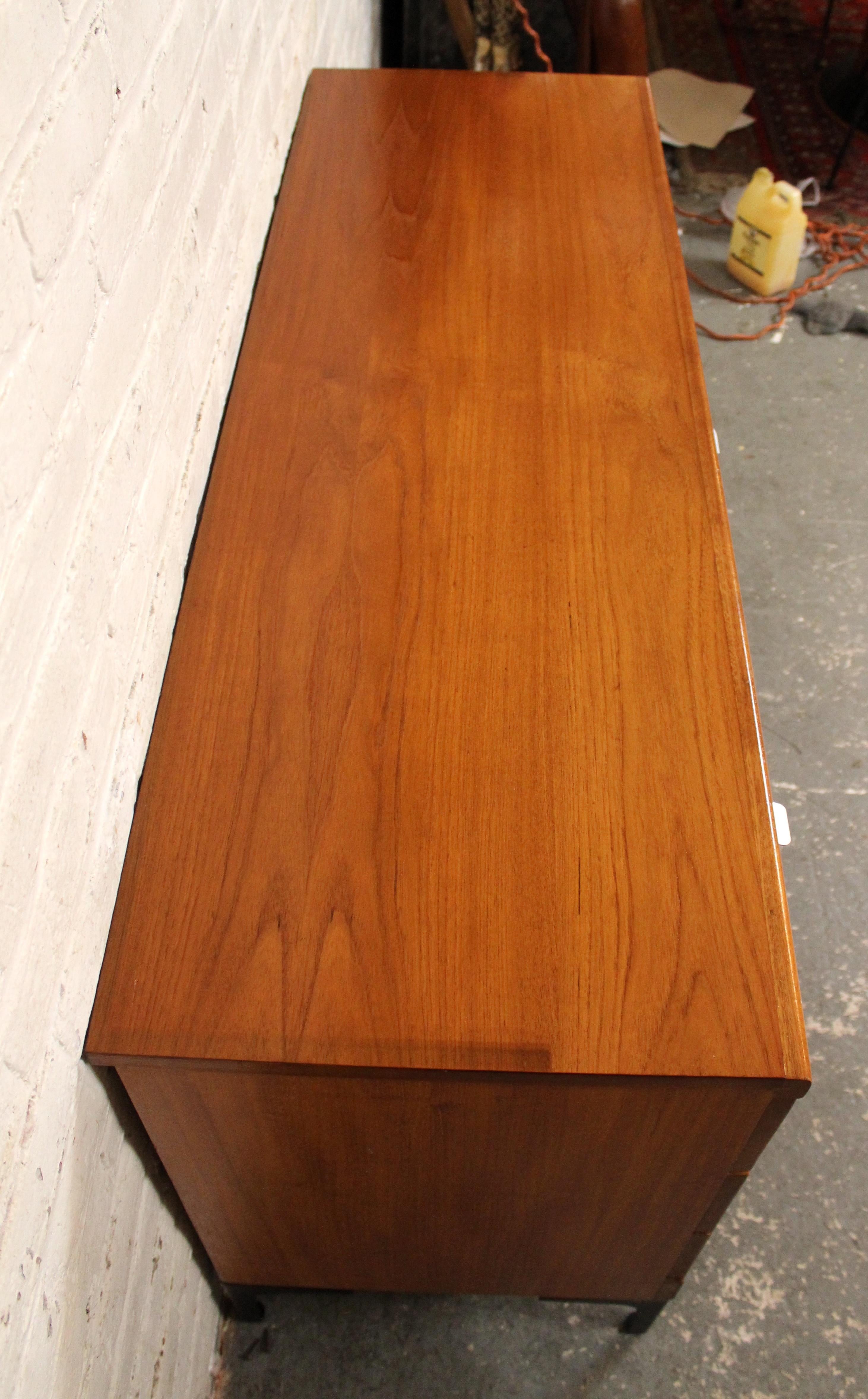 Aluminum Mid-Century Modern British Teak Lowboy Dresser by White & Newton For Sale