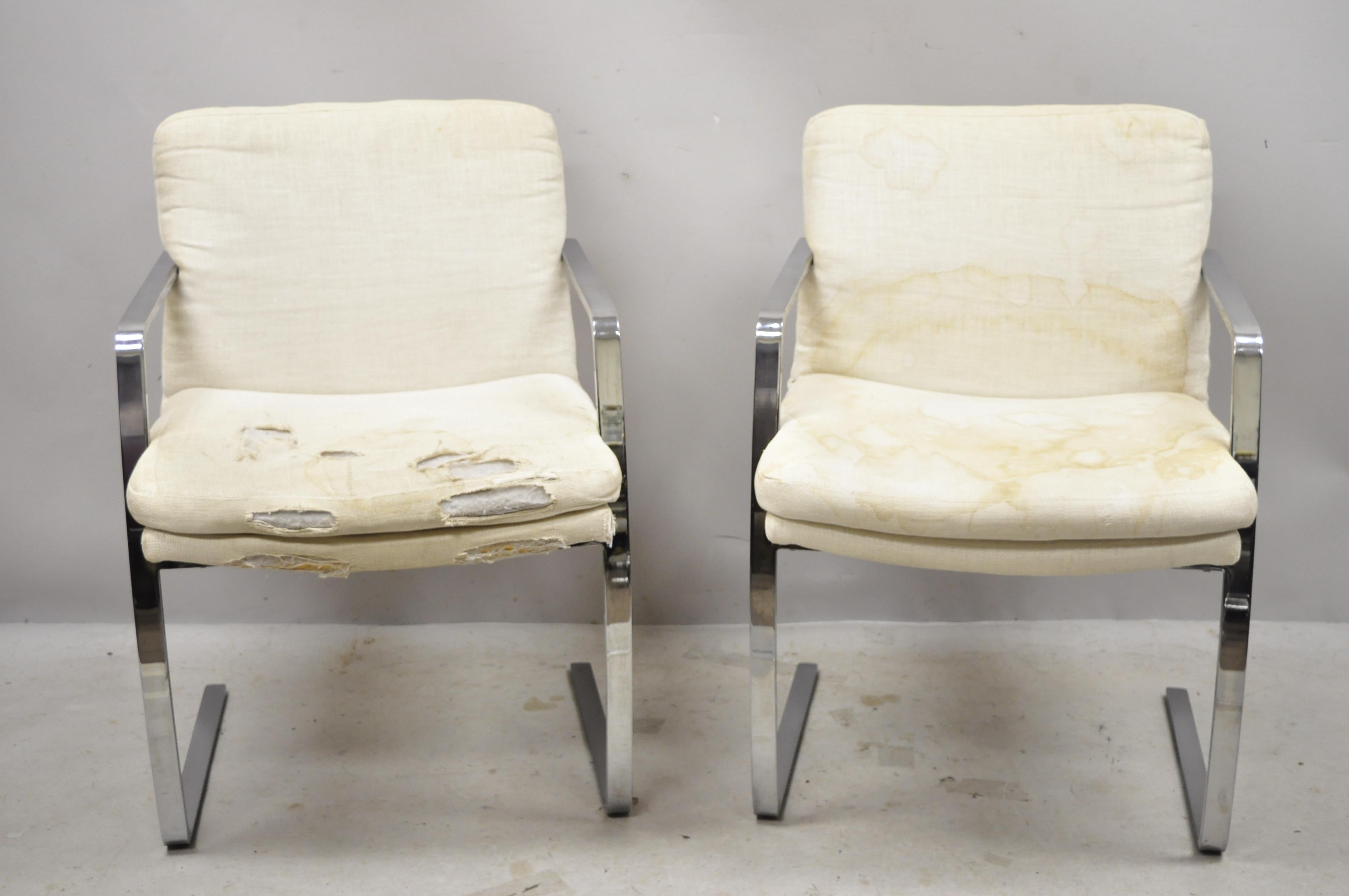 Vintage Mid-Century Modern BRNO style chrome cantilever lounge armchairs (C), a pair. Item features heavy chrome-plated steel cantilever frames, quality American craftsmanship, sleek sculptural form, circa mid to late 20th century. Measurements: 33