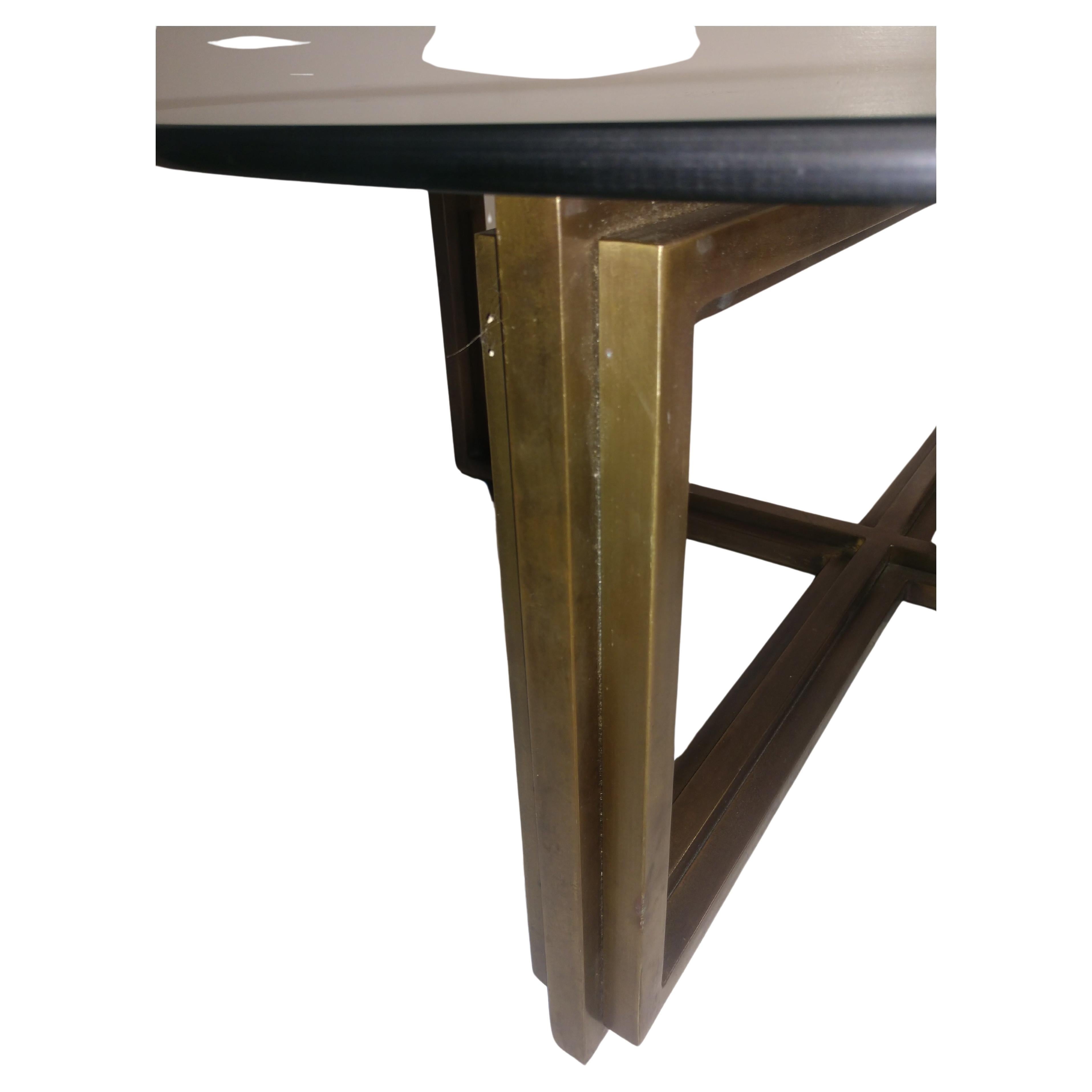 Fabulous X form ribbed bronze base with 1/2 inch polished edge glass top. Bronze has mellowed with age evenly.
Patina is beautiful. Glass is in perfect condition with no chips or scratches. A square piece of glass would work with this also, if