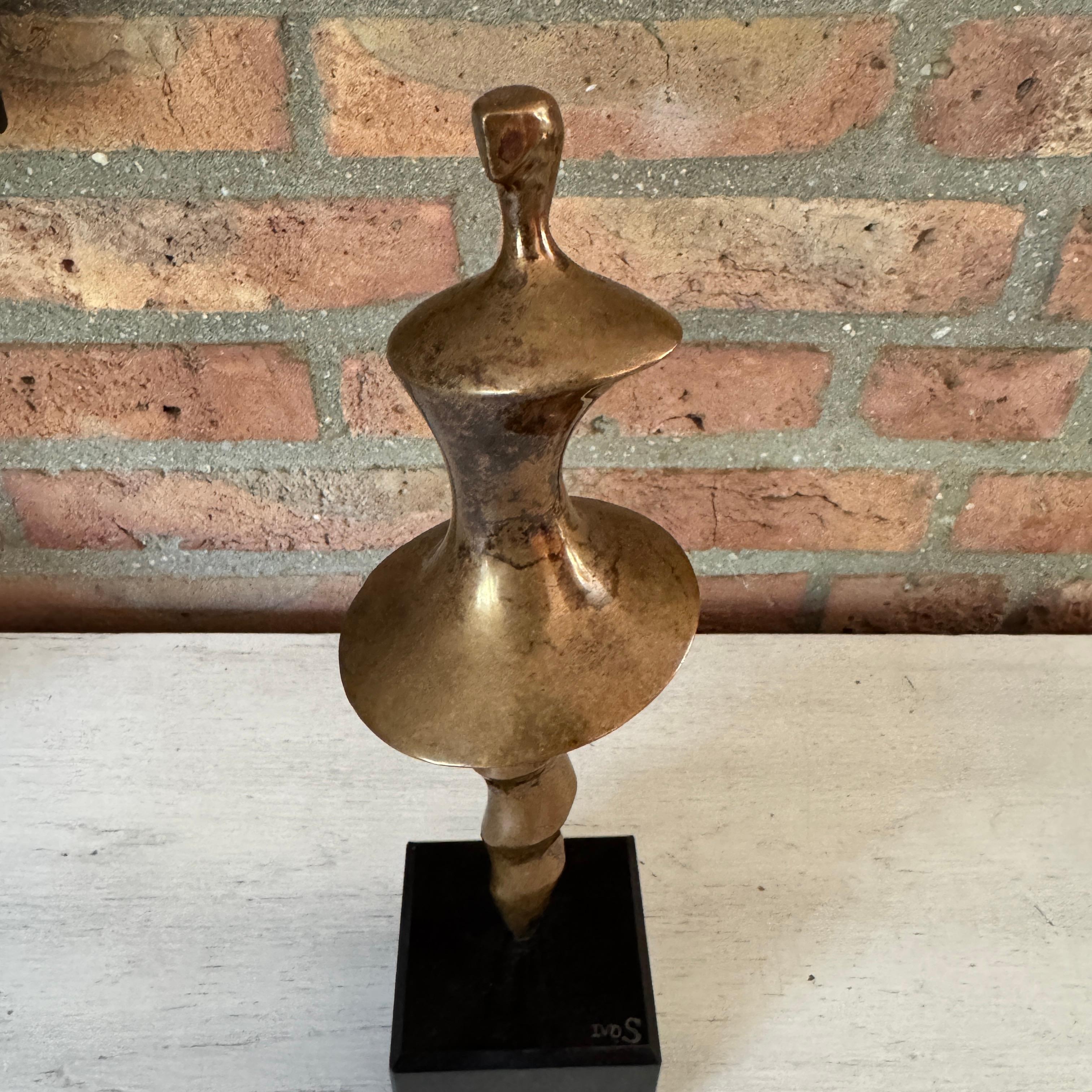 Gorgeous abstract Mid-Century bronze of a dancing female on marble pedestal. 

Sort of an adventure. In the short period that we have owned this statue, we have not been able to find a maker or artist. 
It is clear that this is a very good piece.