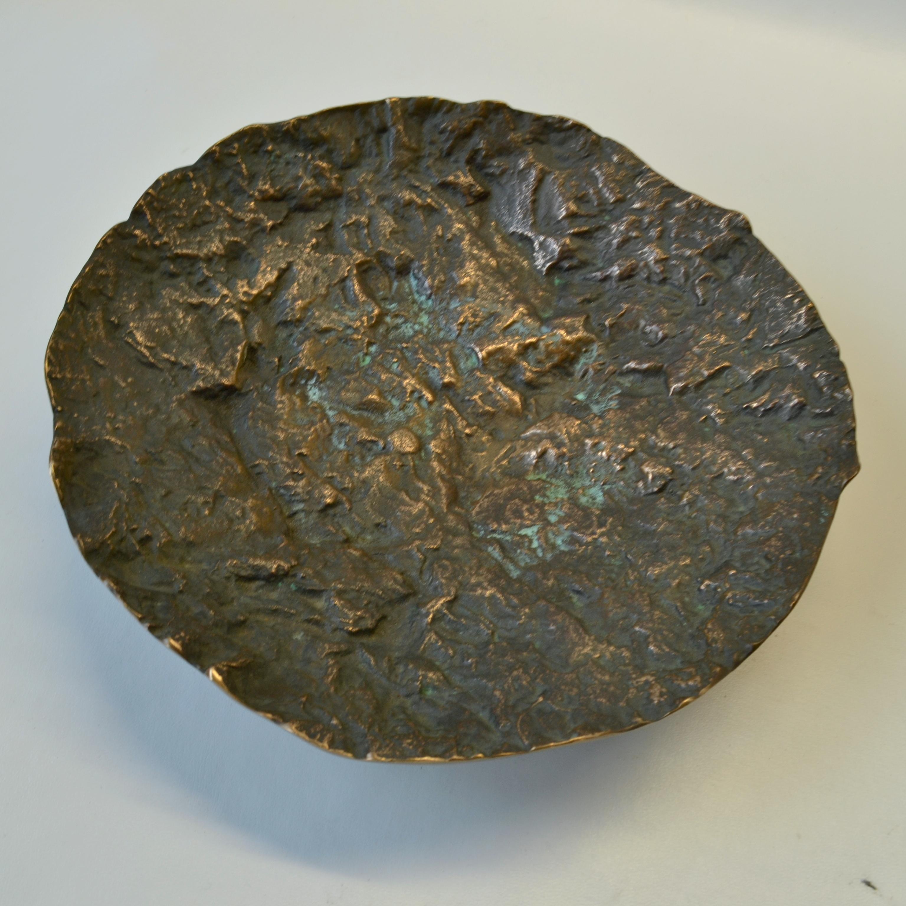 Textural bronze cast bowl on three legs with nice oxidized patina, signed Kaj Blomqvist, Finland.