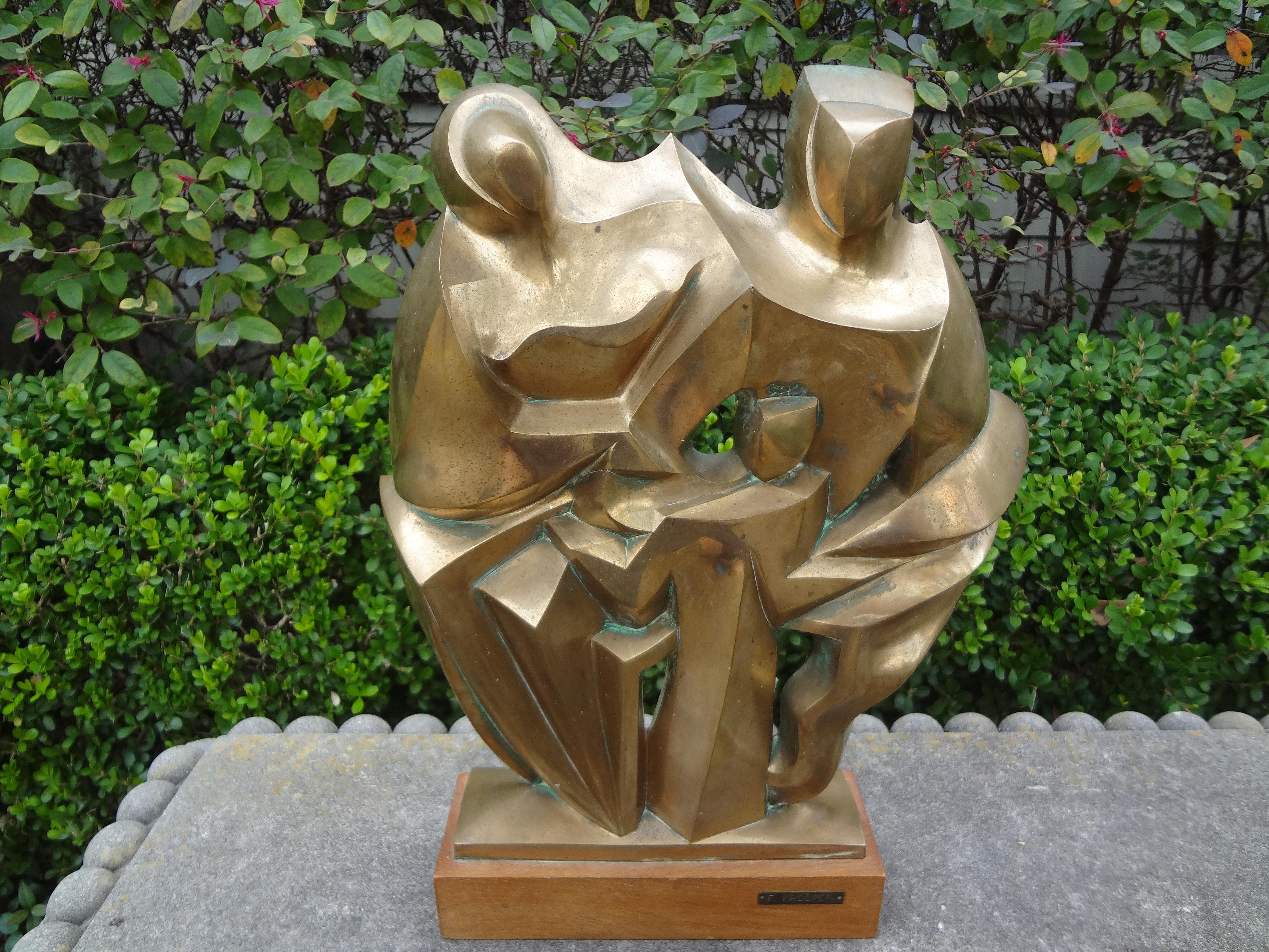 Mid-Century Modern bronze cubist sculpture, signed F. Prosperi.
Beautifully executed Mid-Century Modern gilt bronze cubist sculpture, signed F. Prosperi. This beautifully executed bronze sculpture is mounted on a wooden base with an artist name