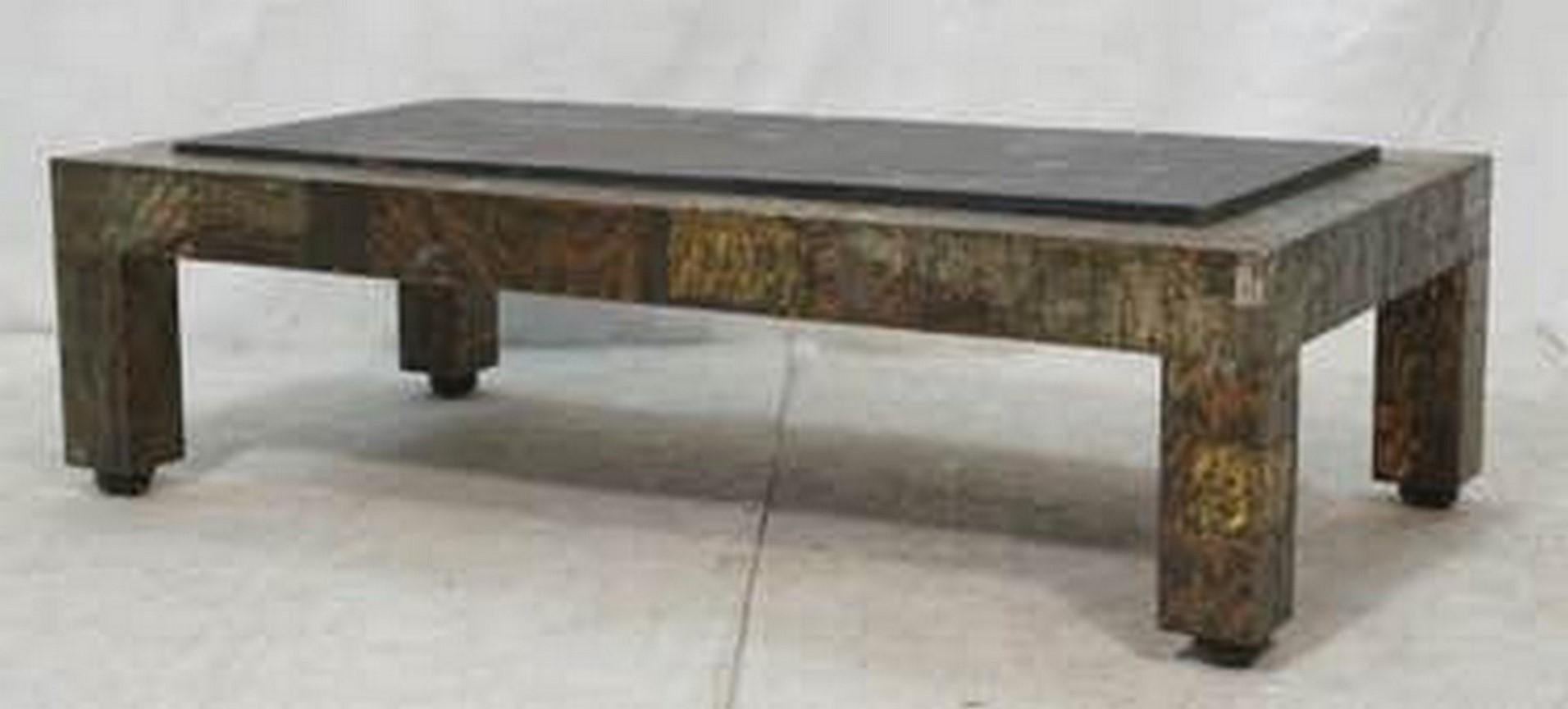 Paul Evans patchwork copper and bronze coffee table with aged riven slate top.
Item location New York.