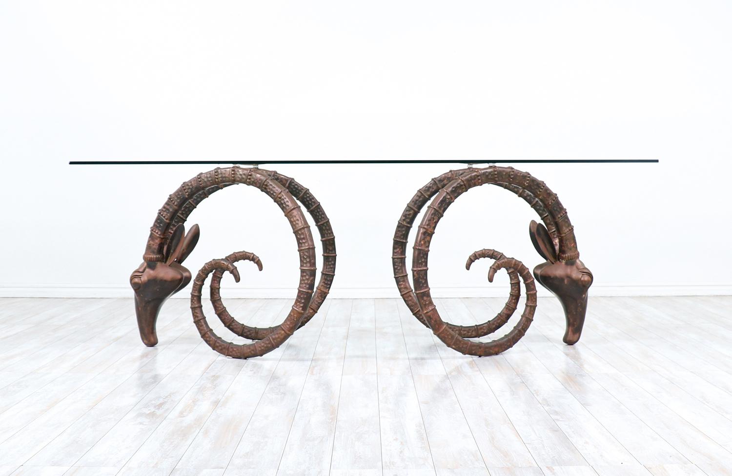 Mid-Century Modern bronze rams head Ibex dining table.

________________________________________

Transforming a piece of Mid-Century Modern furniture is like bringing history back to life, and we take this journey with passion and precision. With
