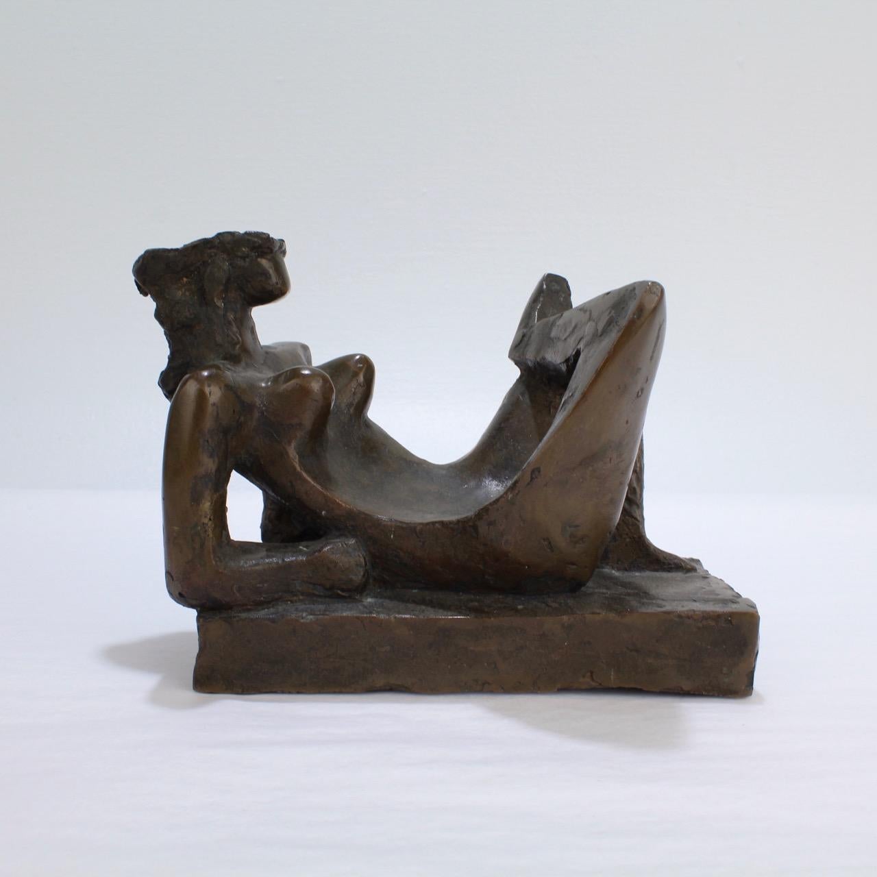 A wonderful stylized mid-century modern nude sculpture of a reclining figure. 

Attributed to Harvey Weiss (1922-2007 - New York). 

Acquired from the estate of Harvey Weiss' sister-in-law and by repute a gift from the artist.

The figure