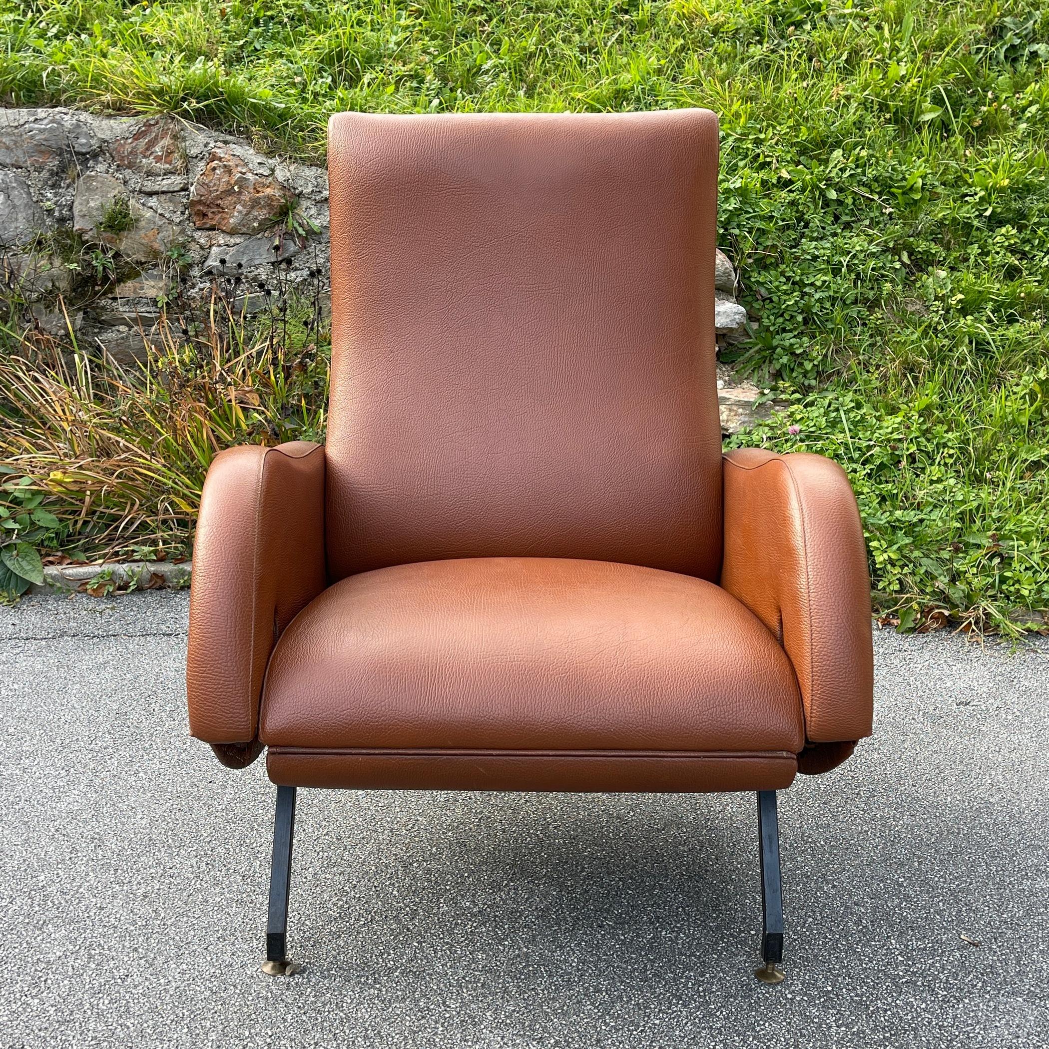 Original leatherette upholstery and featuring a durable hardwood frame with steel legs and adjustable brass ferrules, it's easy to see why this piece is a coveted classic. Not only is it uniquely stylish, it's super comfortable, with a reclining