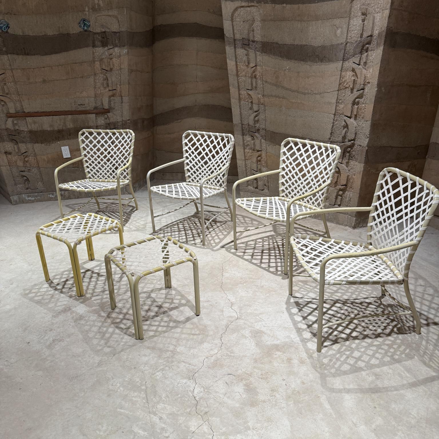 For your consideration, a  mid-century modern patio set (4 Chairs & 2 side tables) by Brown Jordan , USA circa the 1960s. Aluminum painted in yellow (sun faded) with white straps. Some pieces retains the Brown Jordan aluminum label.

Dimensions: