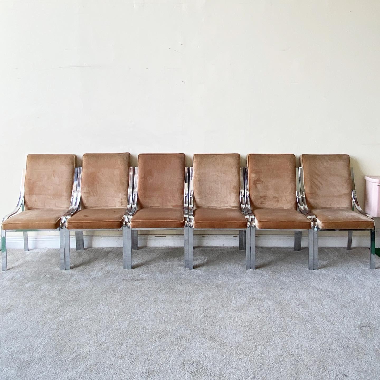 Amazing set of 6 Mid-Century Modern dining chairs. Each features a brown velvet fabric and chrome frame.
 