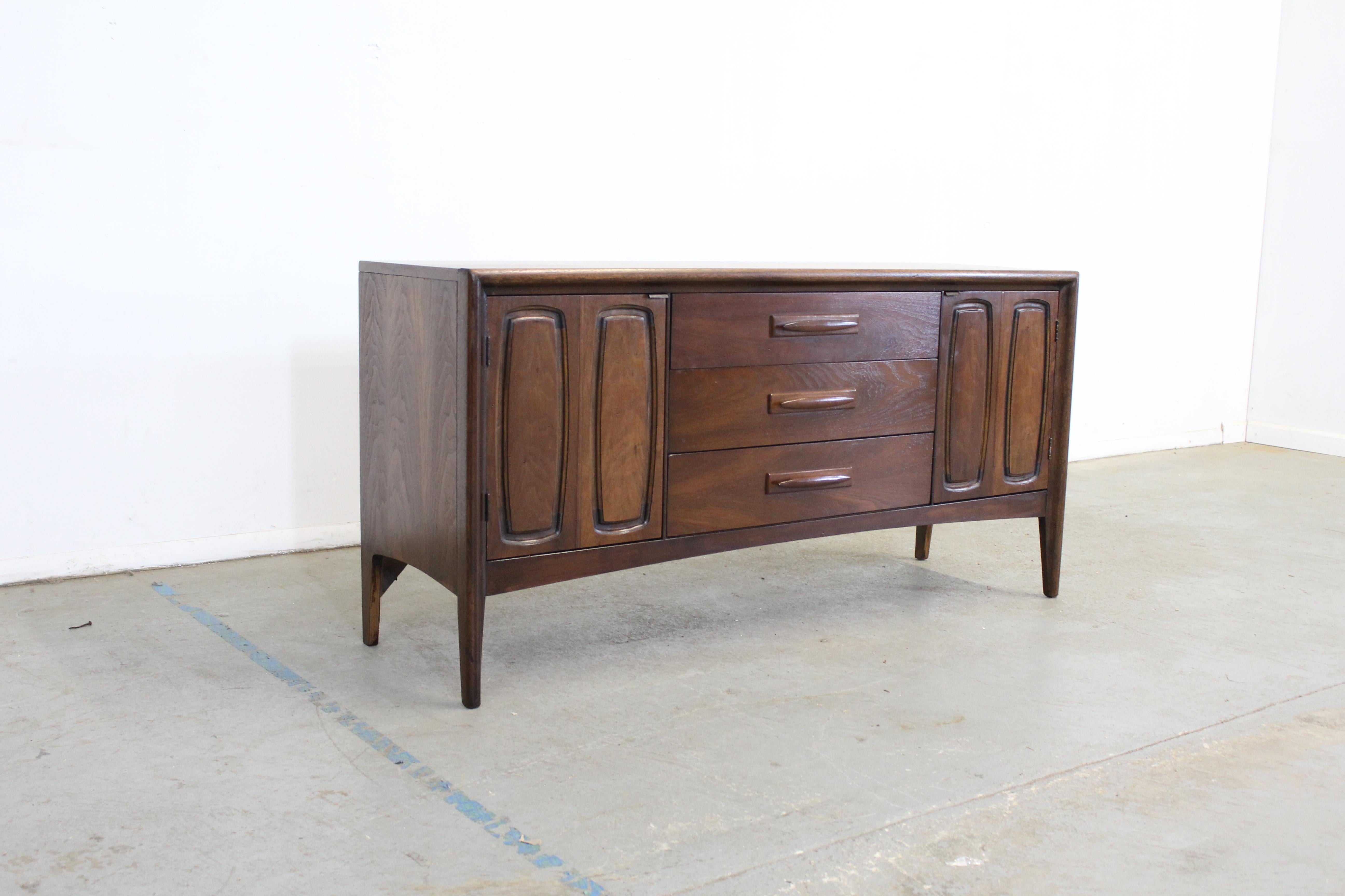 Mid-century mini credenza by Broyhill Emphasis Walnut 

Offered is a vintage mid-century walnut credenza by Broyhill 