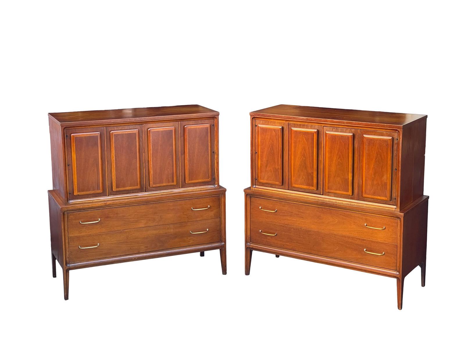 Set of 2 Mid-Century Modern gentlemen’s chest by Broyhill. Part of the rare Forward 70 collection. Beautifully crafted cabinet with gently rounded relief panels on the doors. Fold these doors open to reveal a large storage space inside. Removable