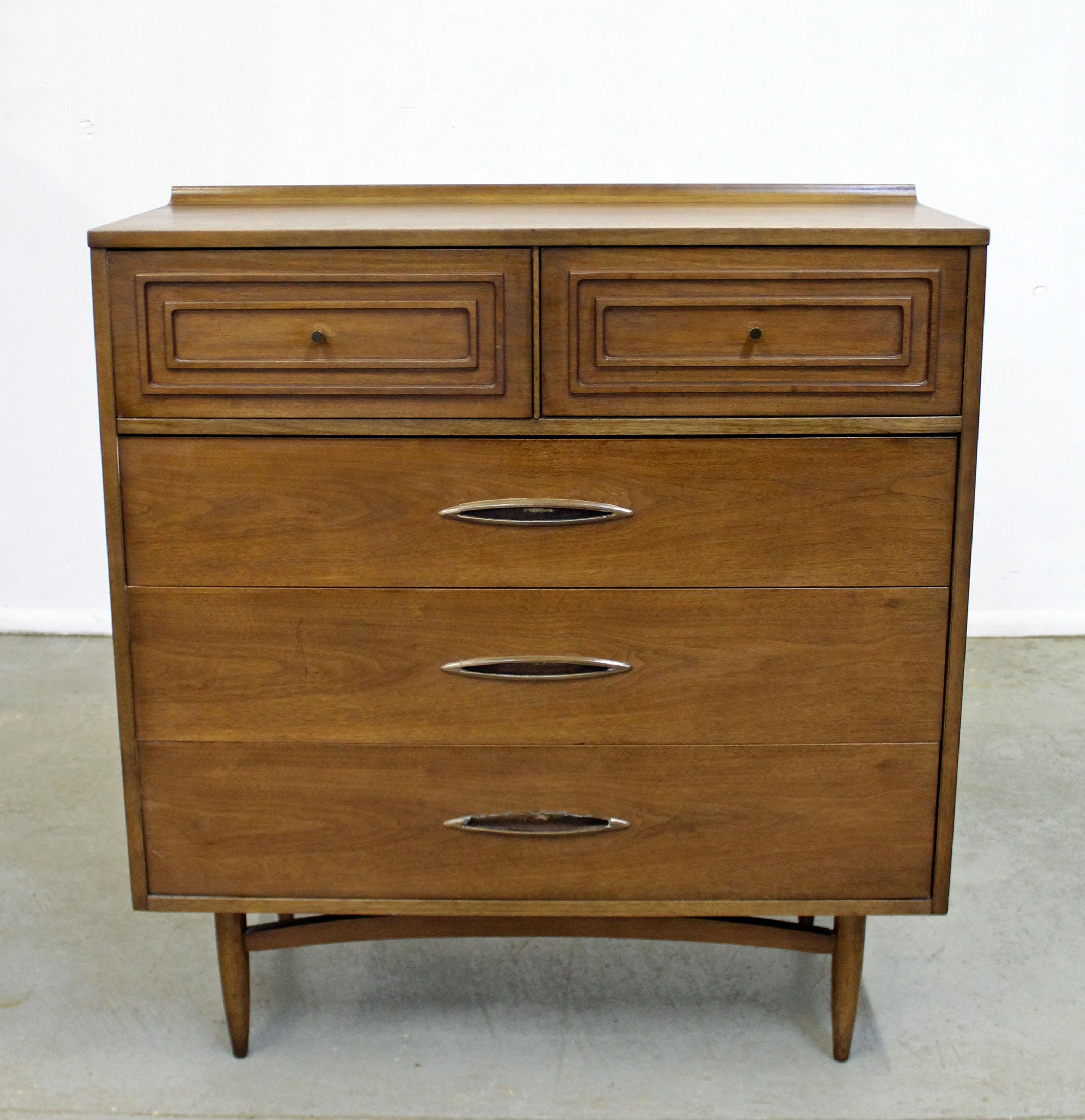 Offered is a walnut tall chest of drawers made for Broyhill Premier's 'Sculptra' line. Has 5 drawers - two small atop with rectangular framing on fronts and three large bottom drawers with faux wood metal pulls. Top large drawer also has a removable