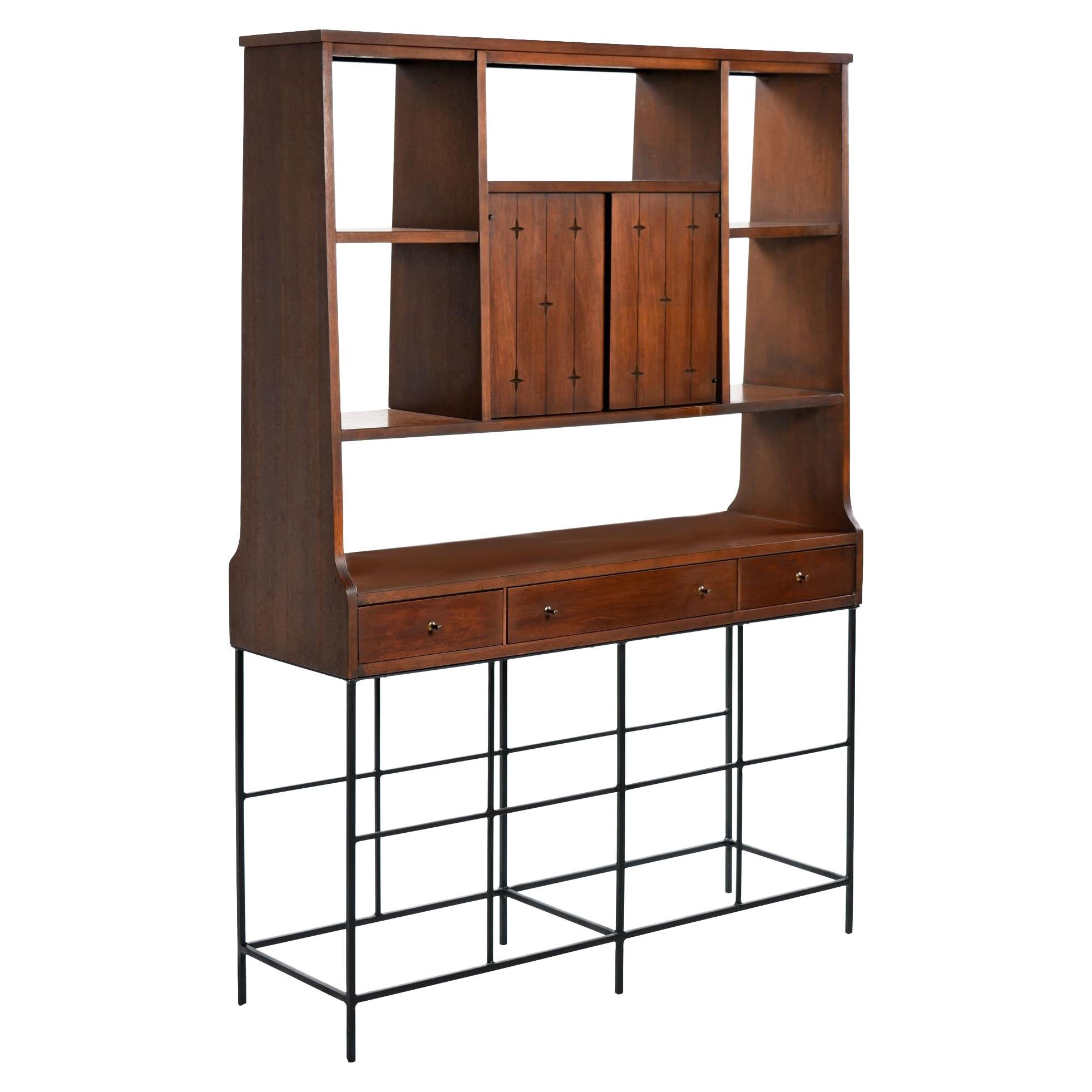 One of a kind Mid-Century Modern Broyhill Saga room divider bookcase with custom made base. One of the most celebrated lines of the Mid-Century Modern Broyhill premier series, the room divider is made of walnut, and features the distinctive star