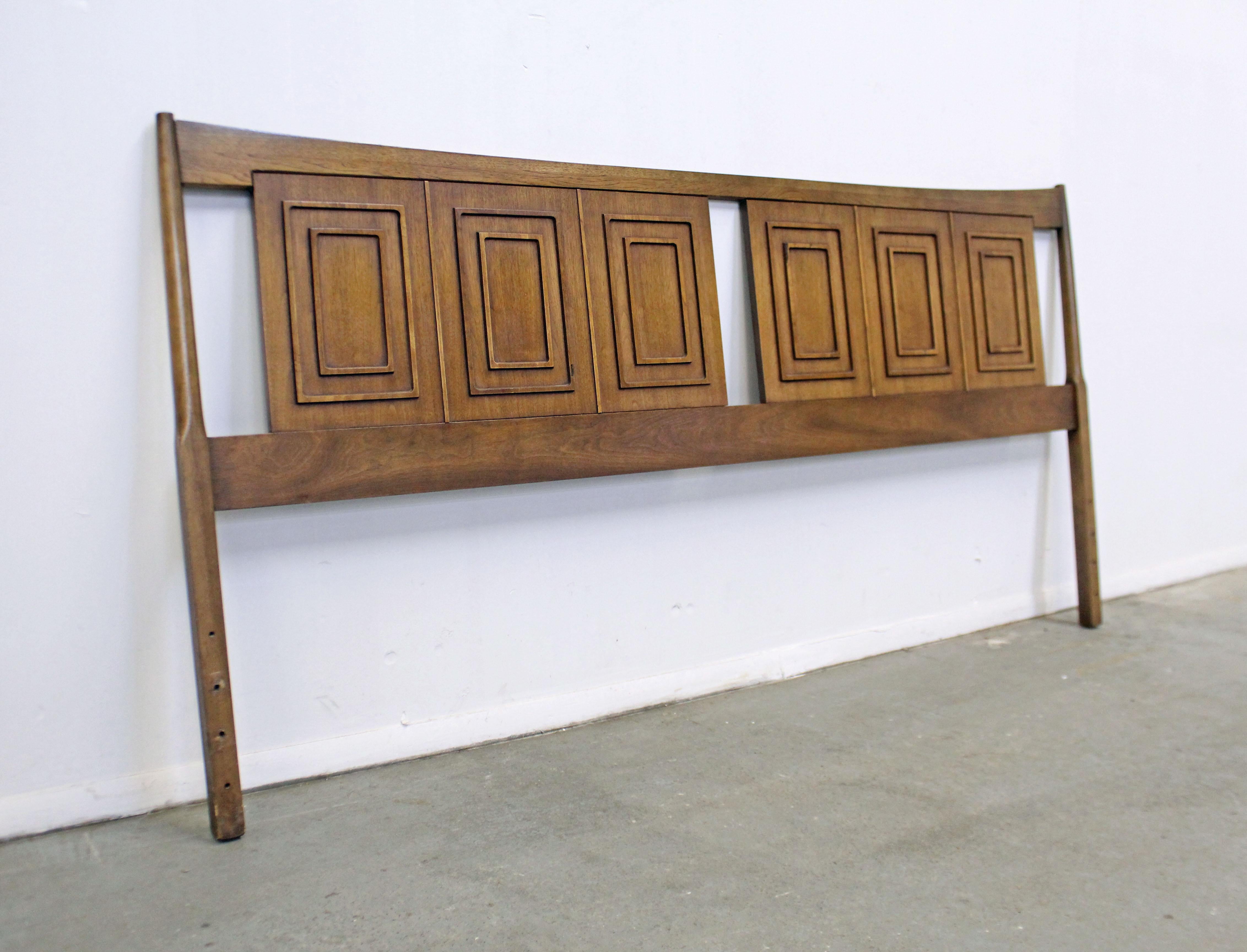 Offered is a vintage Mid-Century Modern king size headboard made for Broyhill's 'Sculptra' line. Looks to be walnut, featuring signature rectangular relief patterns adorning the front. It is in very good, structurally sound condition with minor age