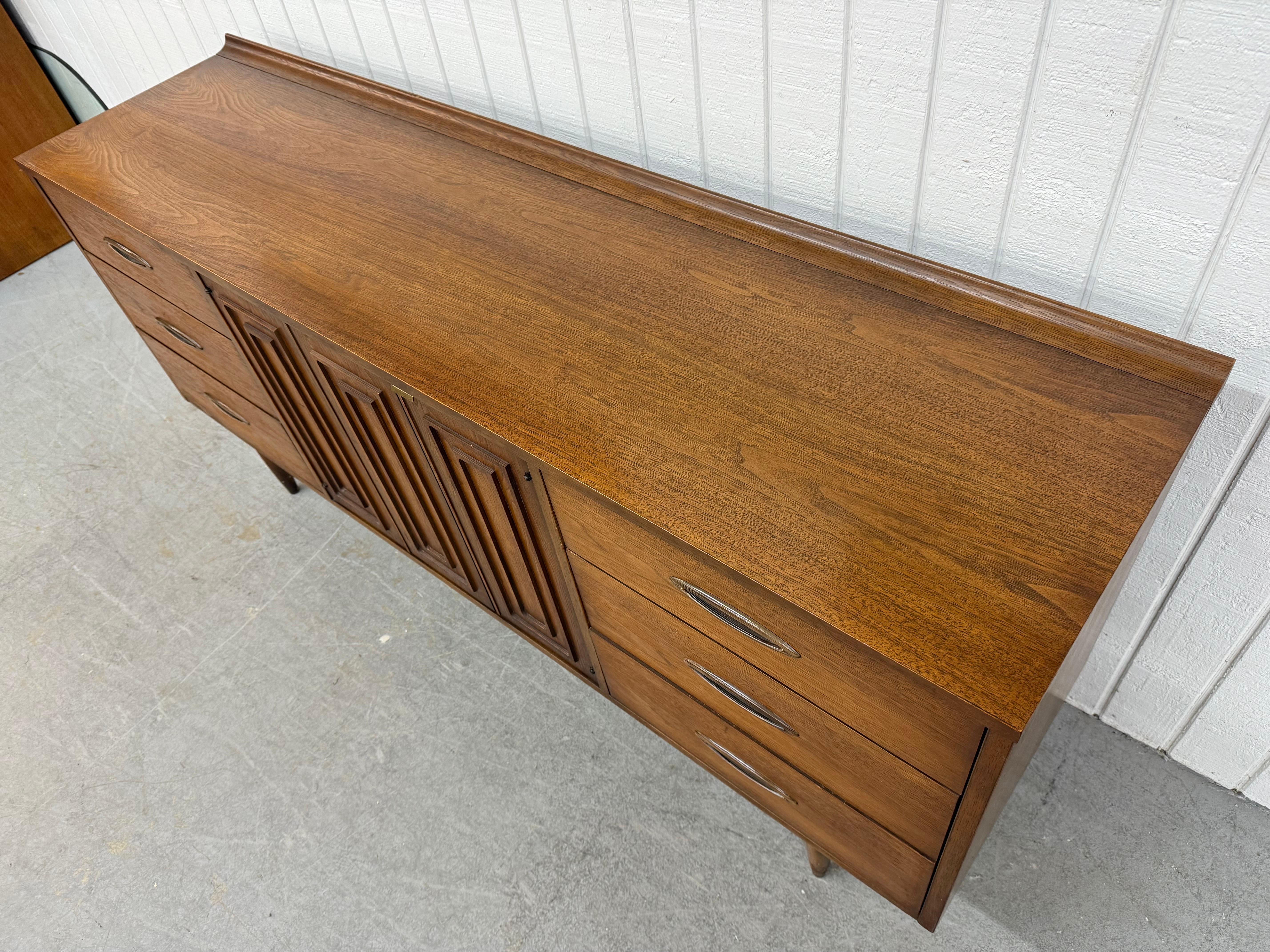 Wood Mid-Century Modern Broyhill Sculptra Walnut 9-Drawer Dresser For Sale