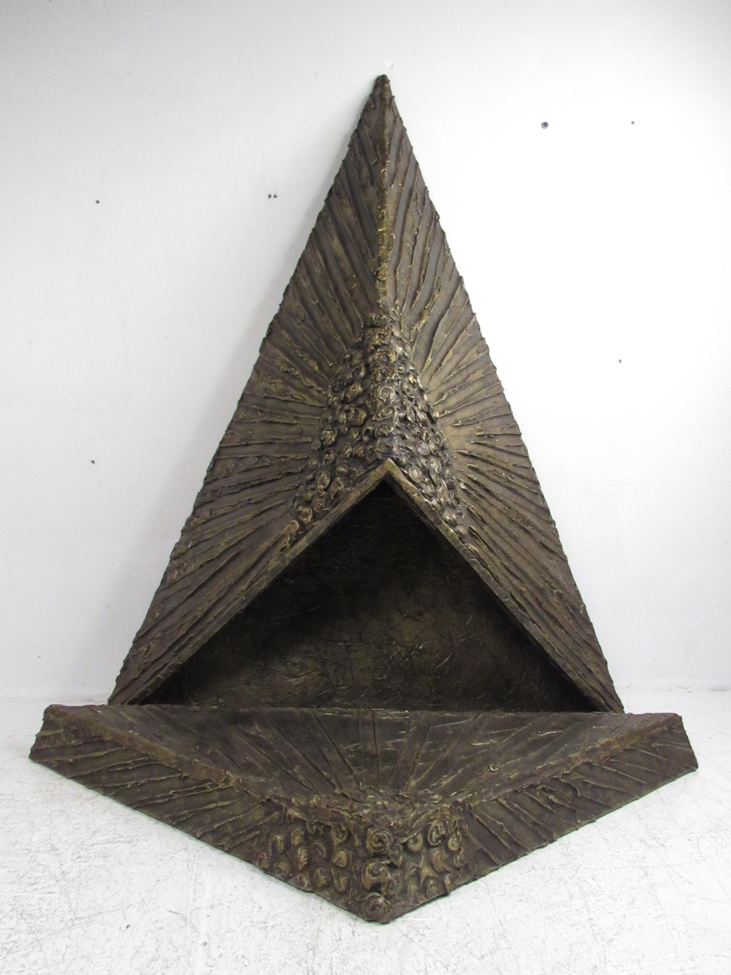 This gorgeous vintage modern fireplace was designed by Adrian Pearsall for Craft Associates. A stylish Brutalist design with carved detail on a textured resin frame. This impressive two-piece fireplace includes a three dimensional triangular top and