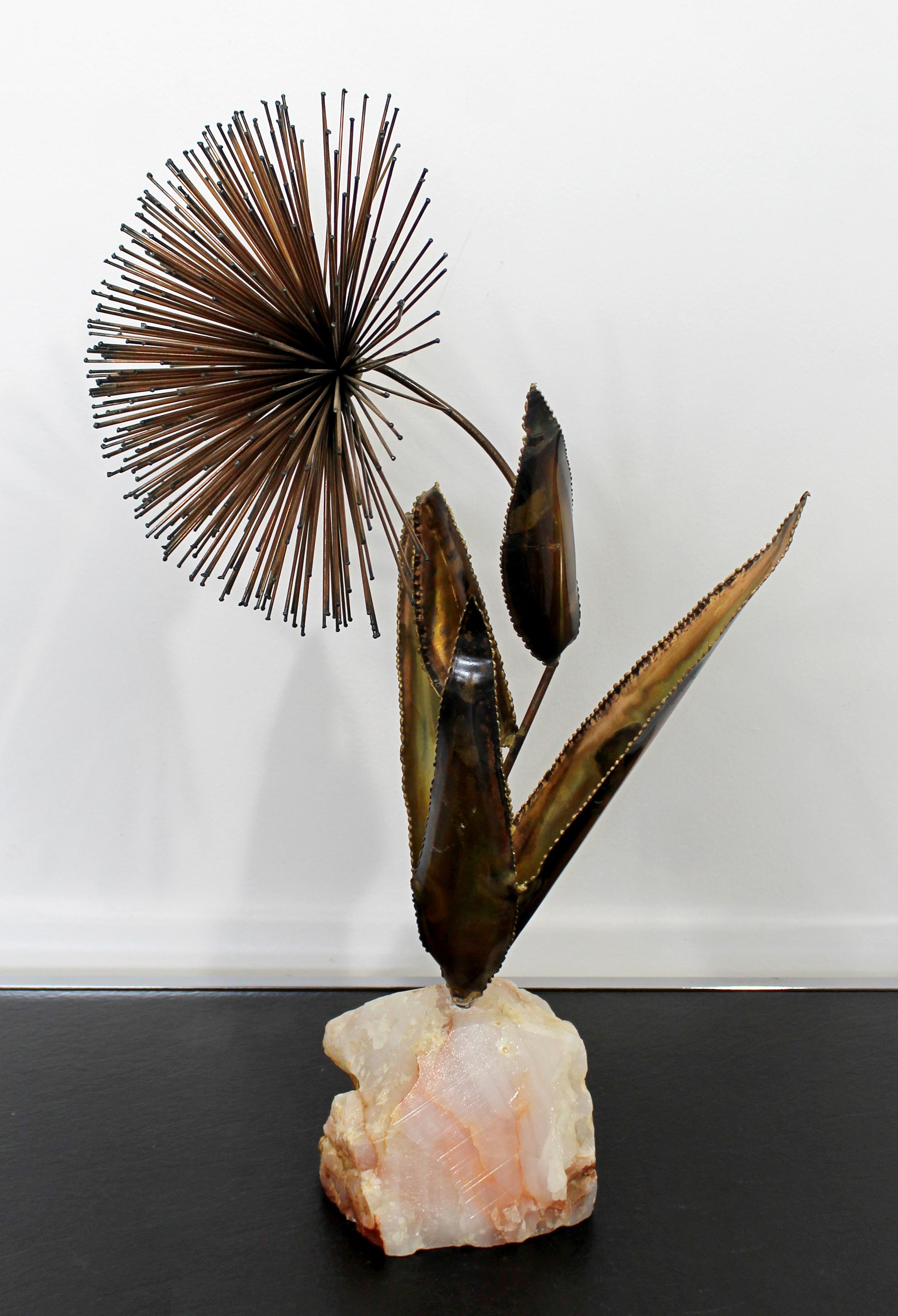 For your consideration is a stunning, brass pom table sculpture, on a quartz base, in the style of Curtis Jere, circa 1970s. In excellent condition. The dimensions are 12