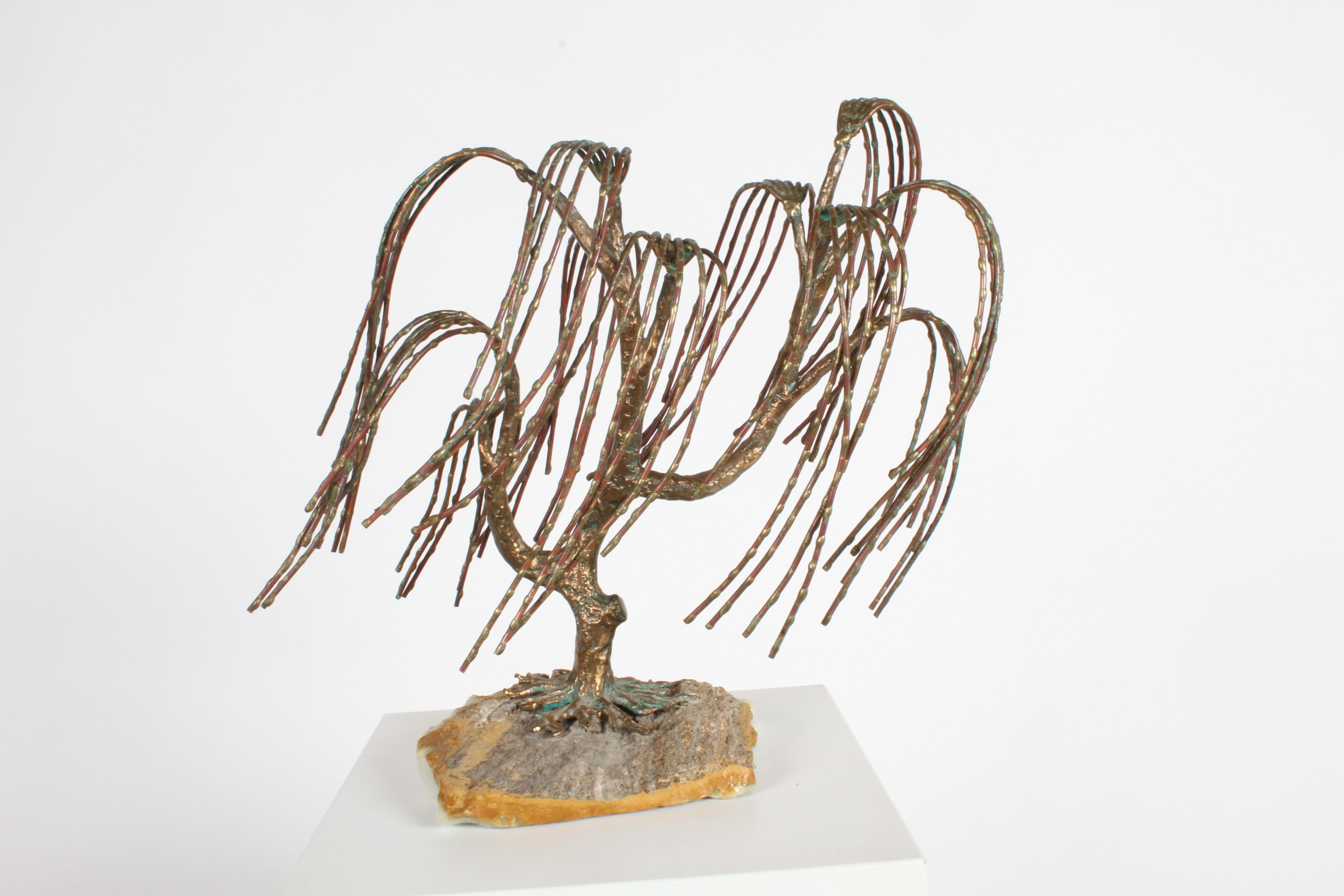 Mid-Century Modern bronze sculpture by the international artist Bijan. Mounted on a natural piece of quartz, elegant weeping willow tree has 11 branches, with each branch having 6 separate weeping shoots. In addition to the bronze branches and