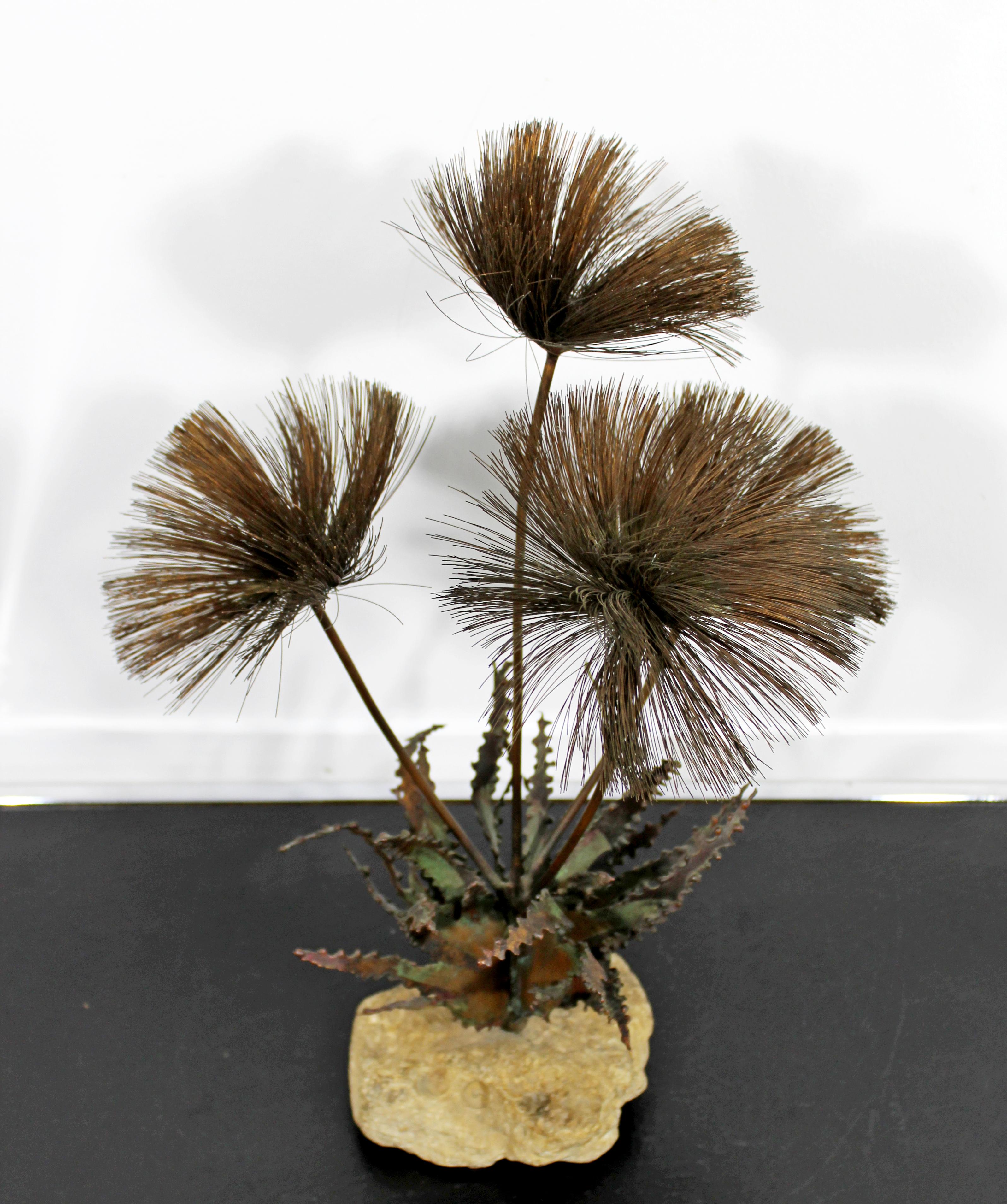 For your consideration is a captivating, copper sculpture of a flower or cactus, on a stone base, signed by John Steck, circa 1970s. In excellent condition. The dimensions are 12