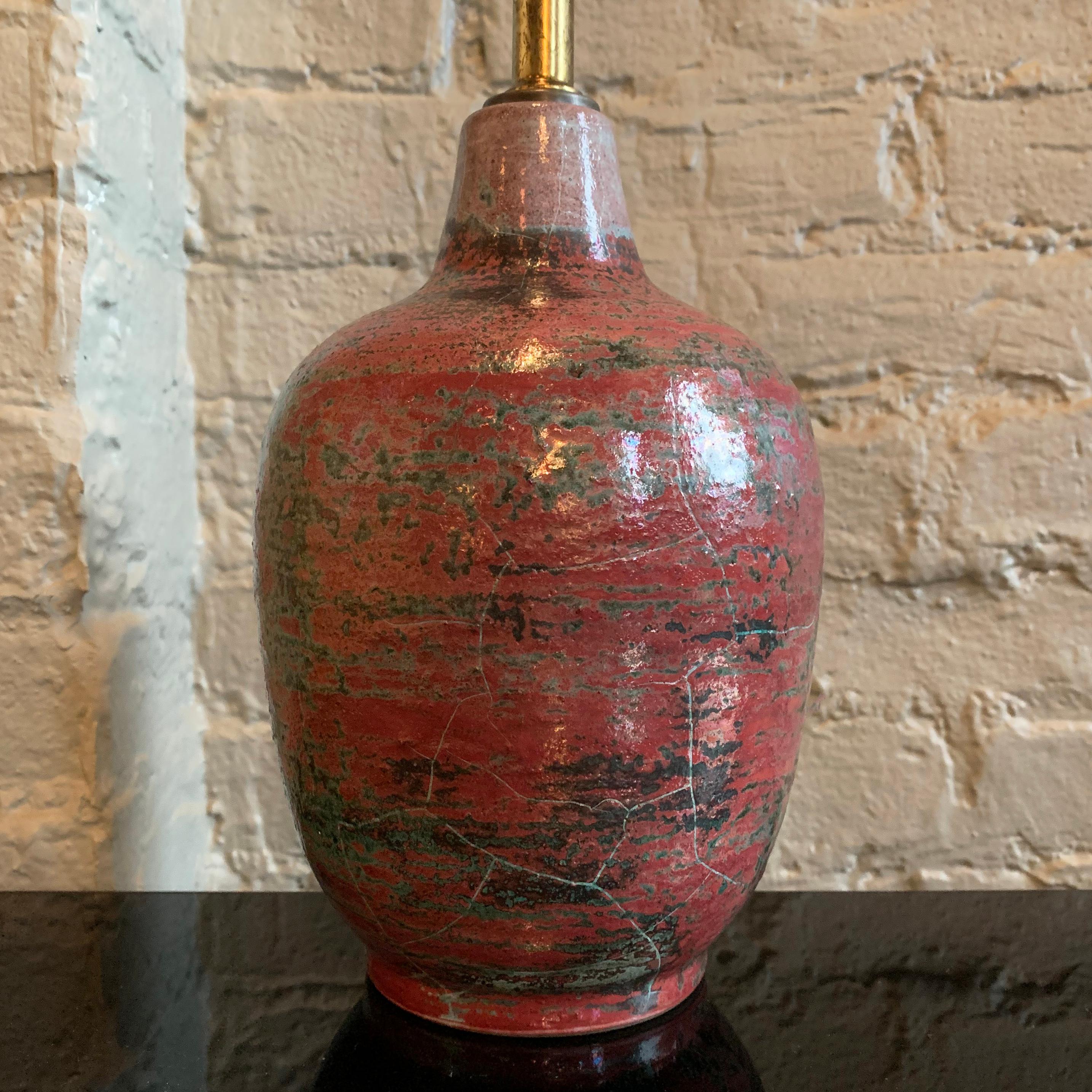 Mid-Century Modern, studio art pottery, table lamp by Gustav Sporri, Switzerland, features an interesting brutalist glaze with 