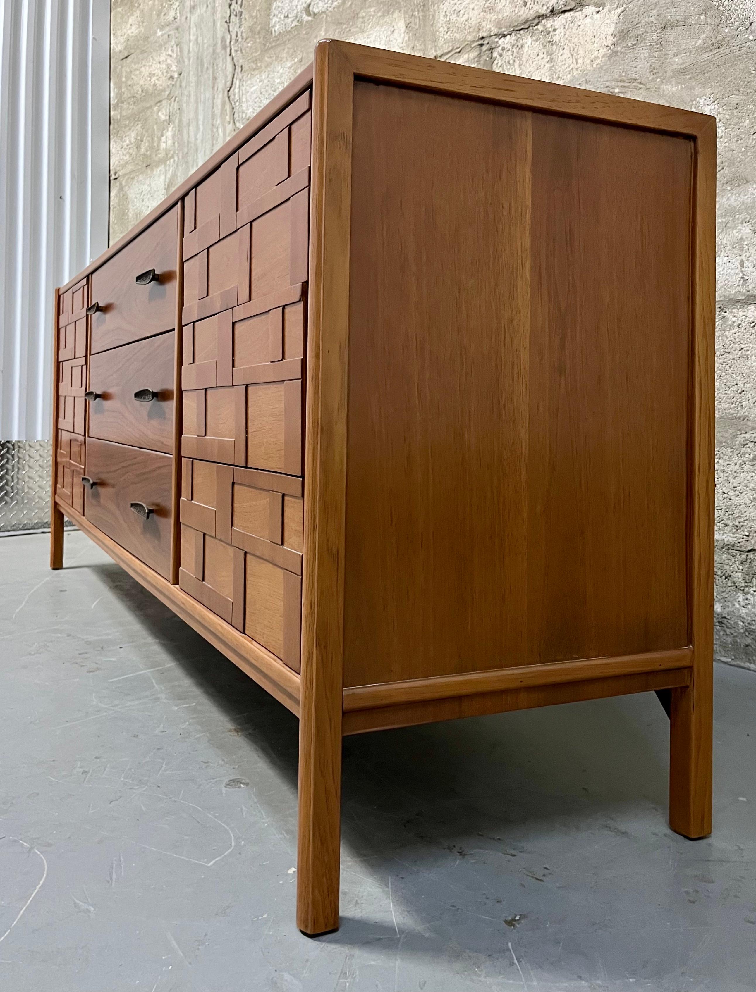 Wood Mid Century Modern Brutalist Inspired Nine Drawers Dresser. Circa 1960s For Sale