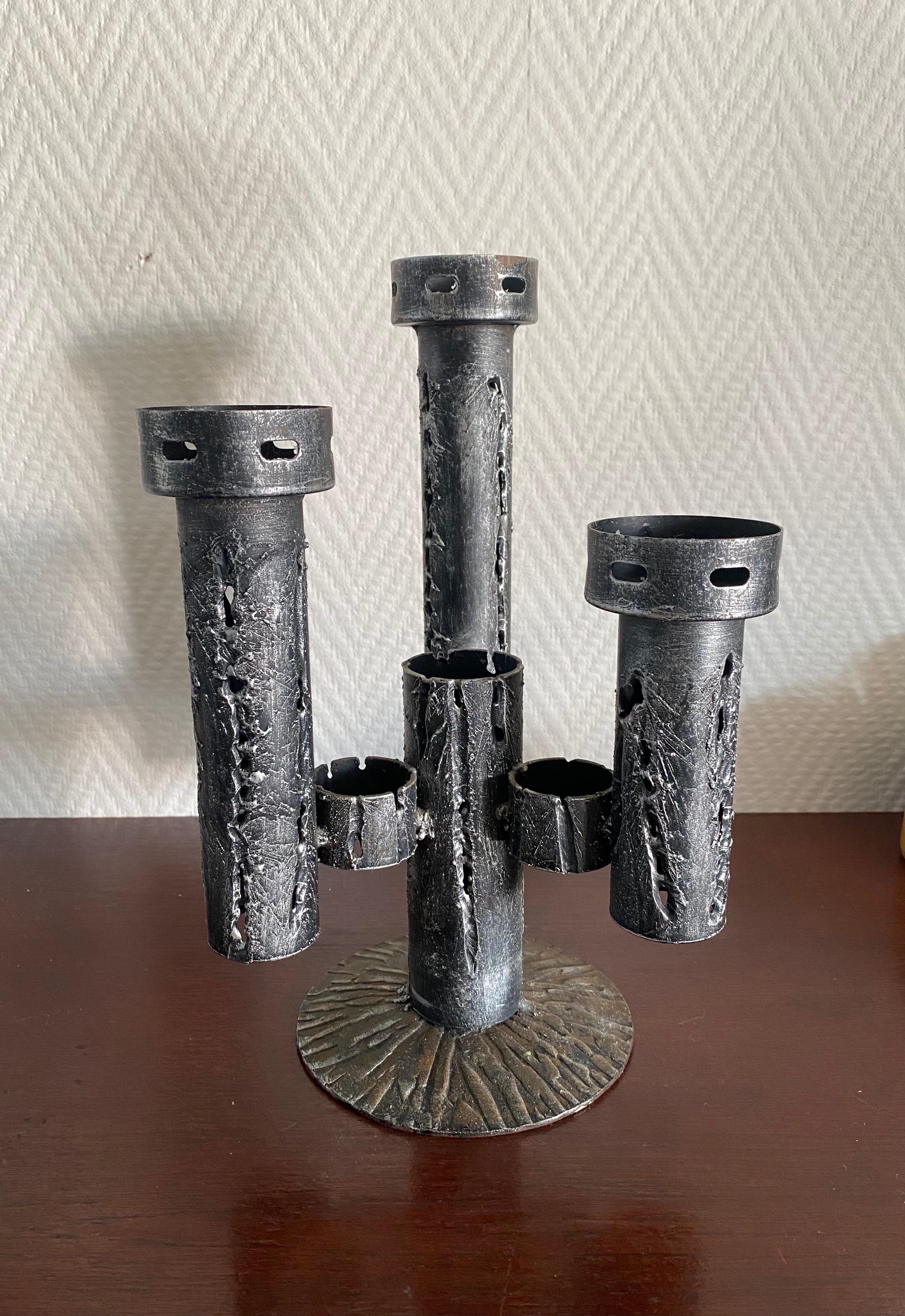 Stunning Brutalist piece with space for three candles. Design period ca, 1960s-1970s. 
This candlestick remains in good condition with slight traces of age and use. Nice patina! If you are interested in this item, feel free to make us a reasonable