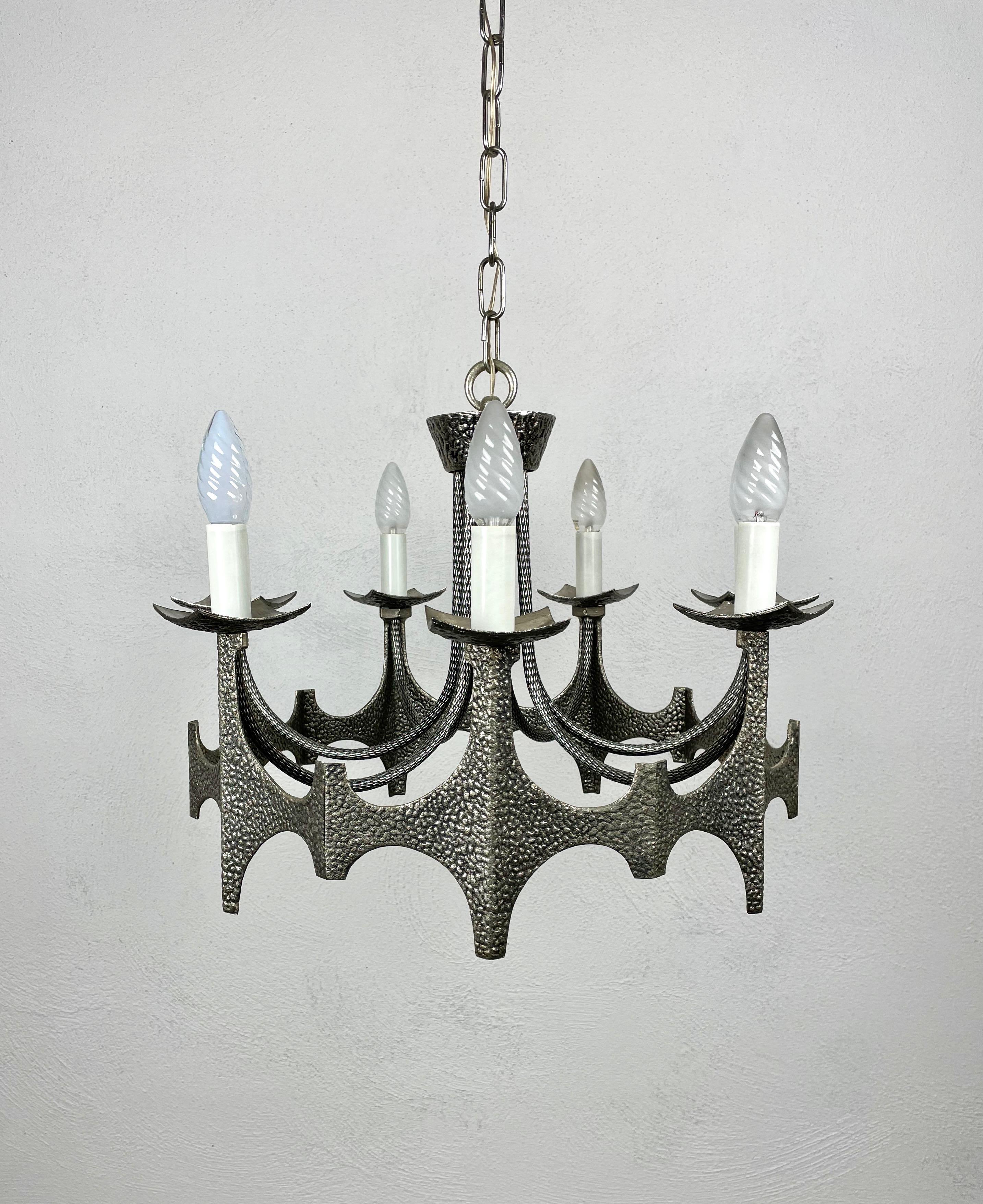 Mid-Century Modern pendant chandelier in iron, Brutalist style, seven lights.