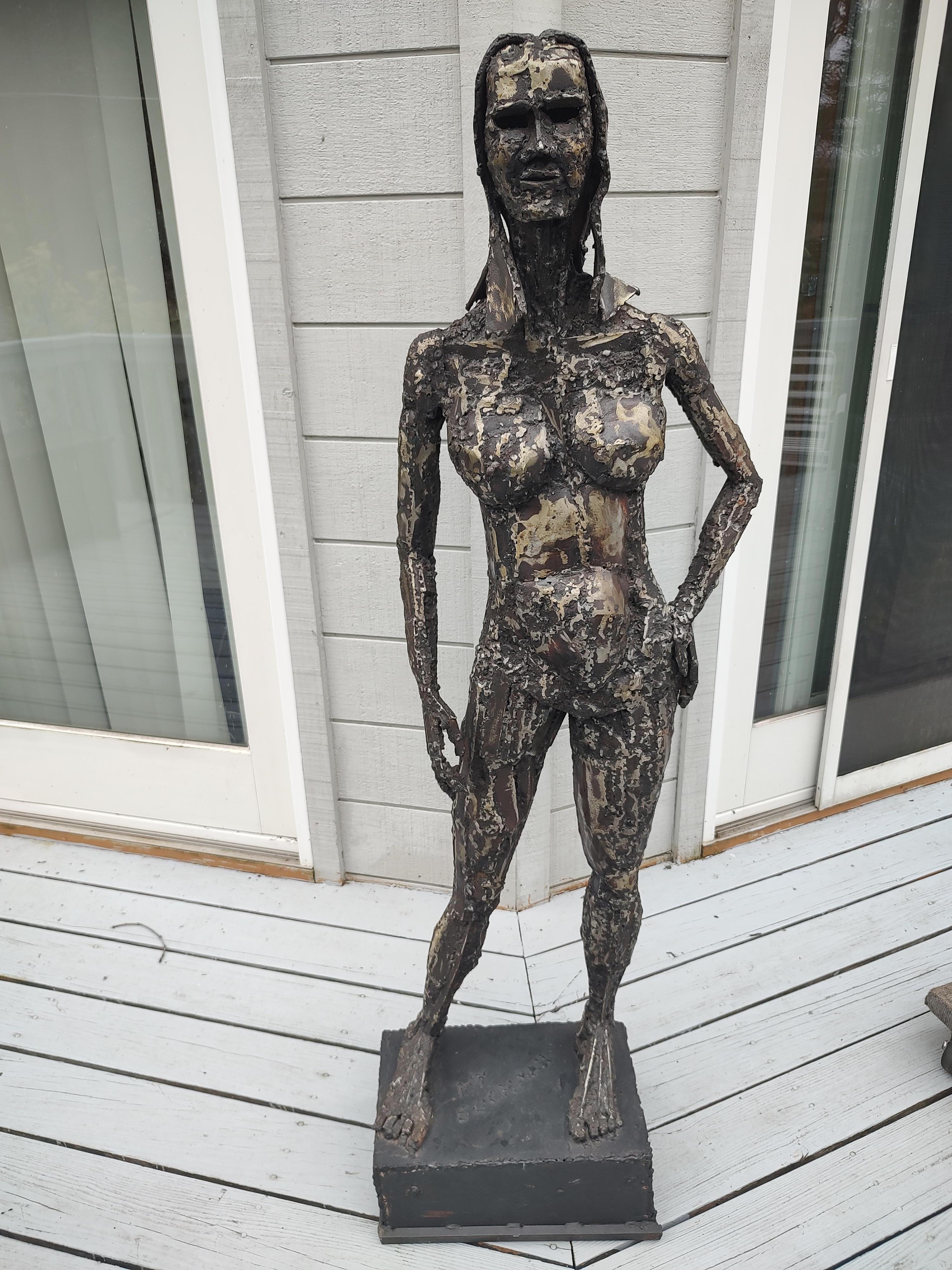 Fantastic steel & iron figurative sculpture of a lifesize nude woman created by artist Hy Suchman.  Sculpture is approximately 5ft 2 inches tall with a width and depth of 24 X 20. Amazing Sculptural details in the Brutalist style of the late sixties